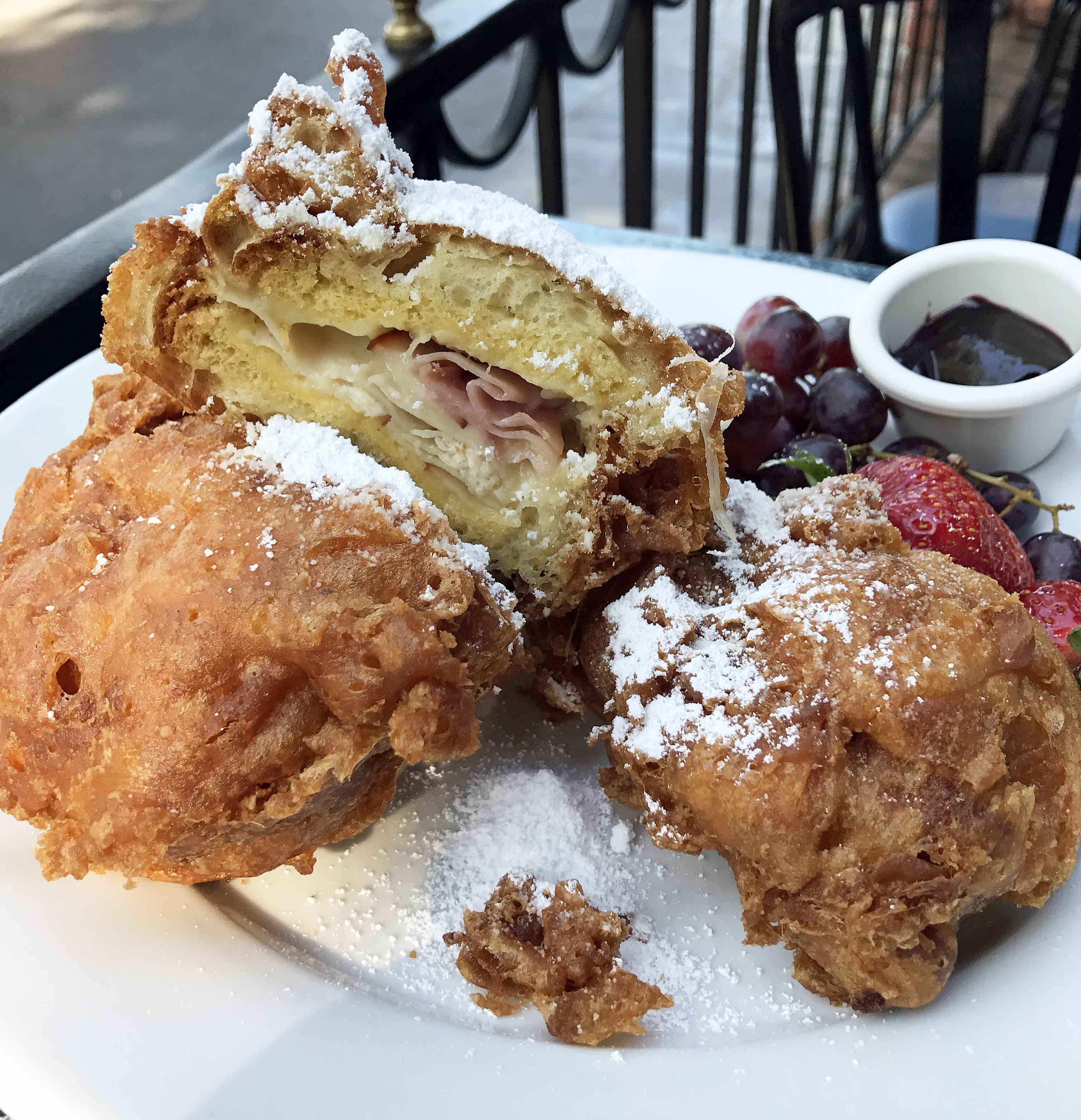 Monte Cristo Sandwich at Disneyland. The Best Eats and Treats at Disneyland. The best food to eat at Disneyland. A list of the most popular and favorite food at Disneyland parks. A list of what to eat at Disneyland. www.modernhoney.com