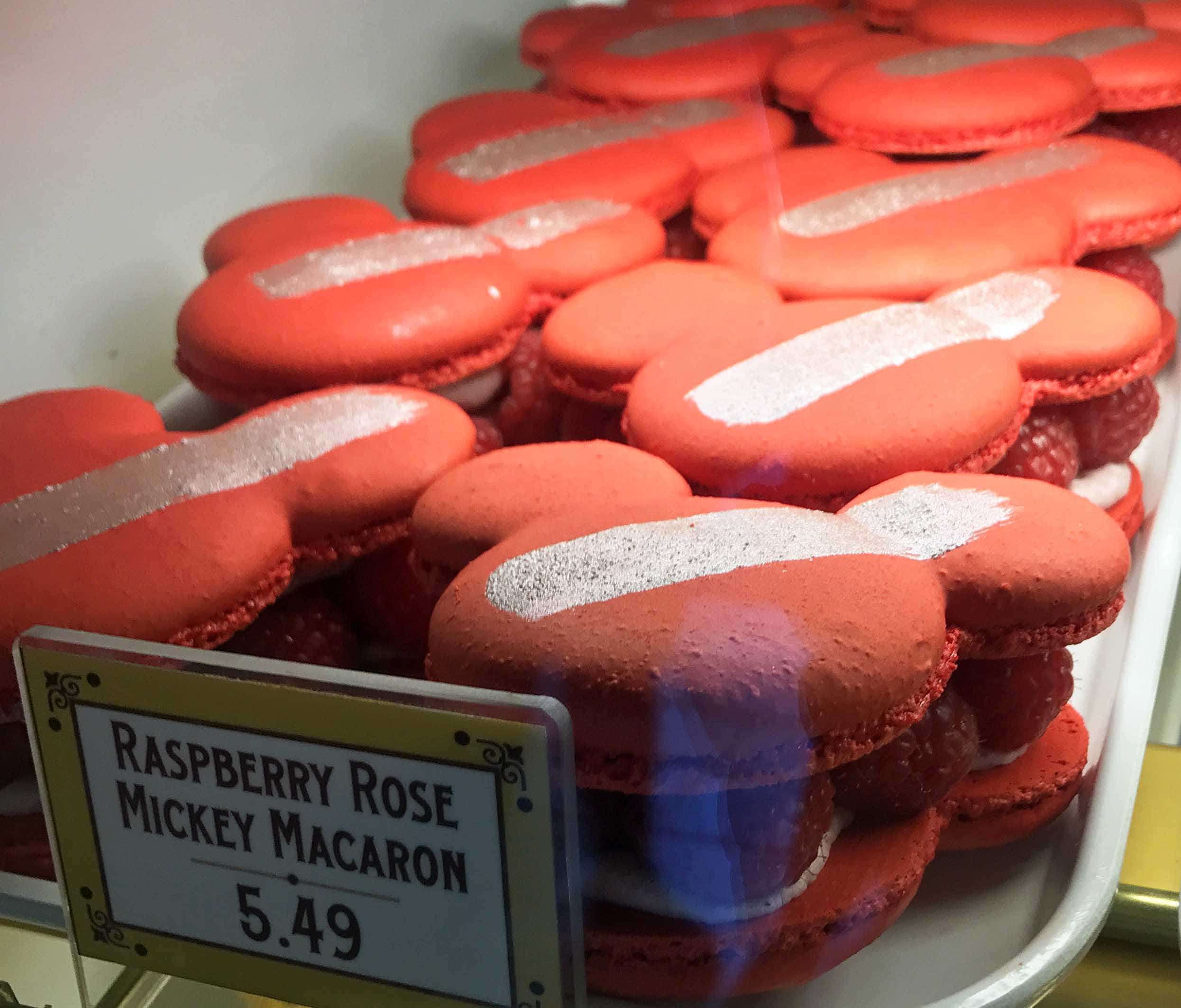 Raspberry Rose Mickey Macaron. The Best Eats and Treats at Disneyland. The best food to eat at Disneyland. A list of the most popular and favorite food at Disneyland parks. A list of what to eat at Disneyland. www.modernhoney.com