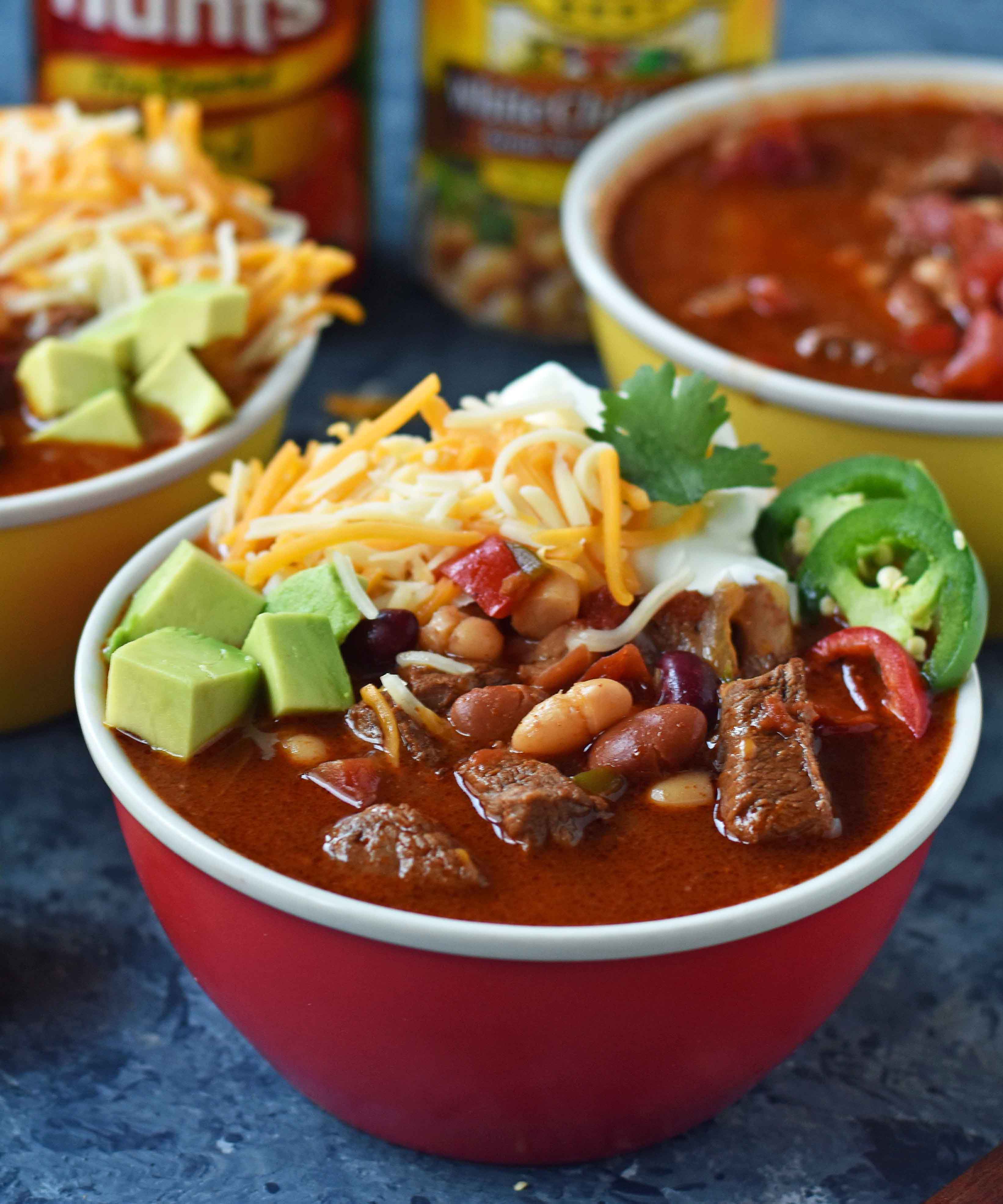 MJ's Award-Winning Chili is made with tender beef chuck roast simmered to perfection, onions, peppers, chili beans, fire-roasted tomatoes, and mexican spices. A perfect prize-winning chili recipe. www.modernhoney.com