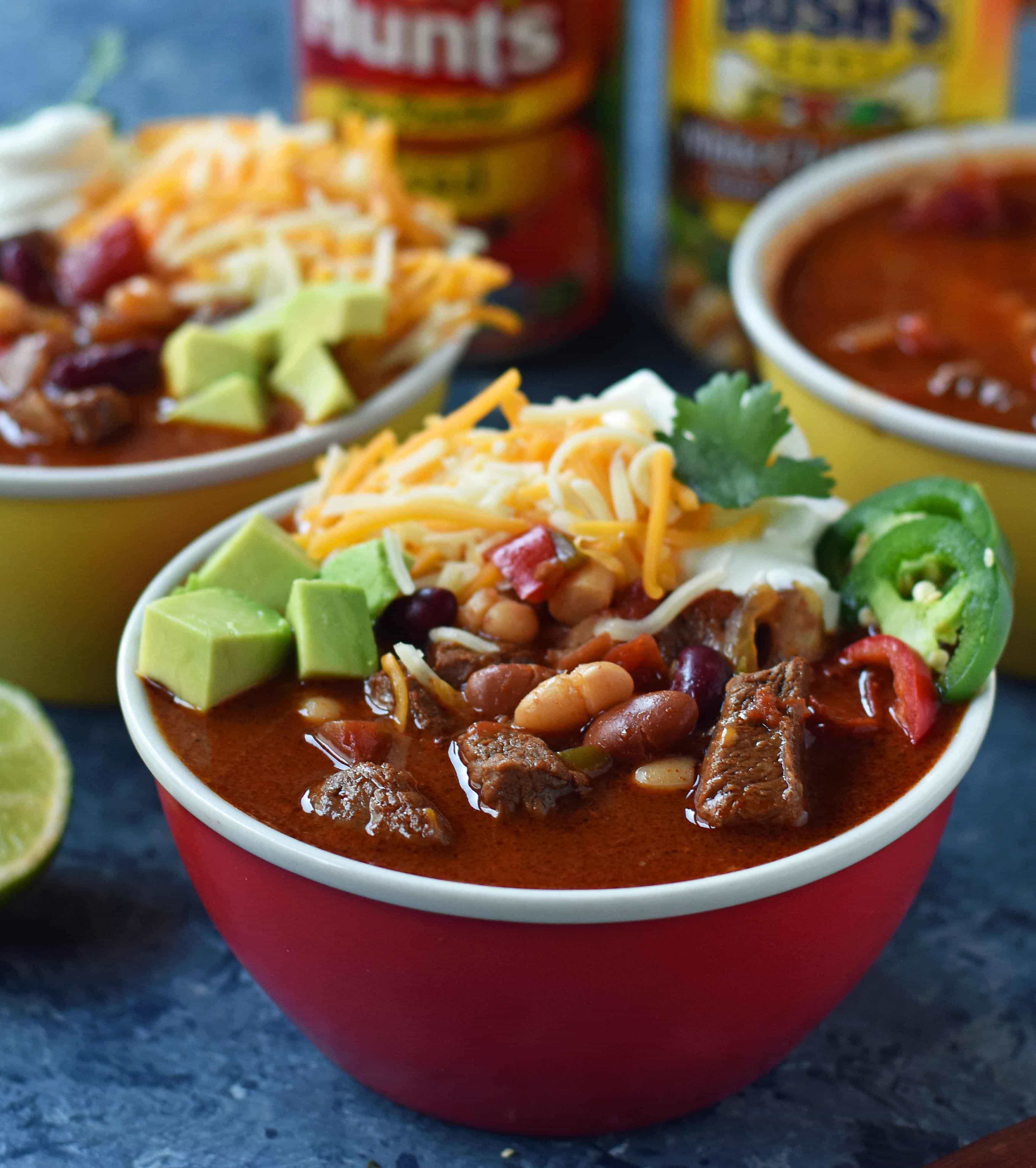 MJ's Award-Winning Chili is made with tender beef chuck roast simmered to perfection, onions, peppers, chili beans, fire-roasted tomatoes, and mexican spices. A perfect prize-winning chili recipe. www.modernhoney.com