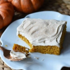 Pumpkin Sheet Cake with Cream Cheese Frosting. A pumpkin spice cake with a creamy homemade cream cheese frosting. A super simple, easy cake recipe! www.modernhoney.com