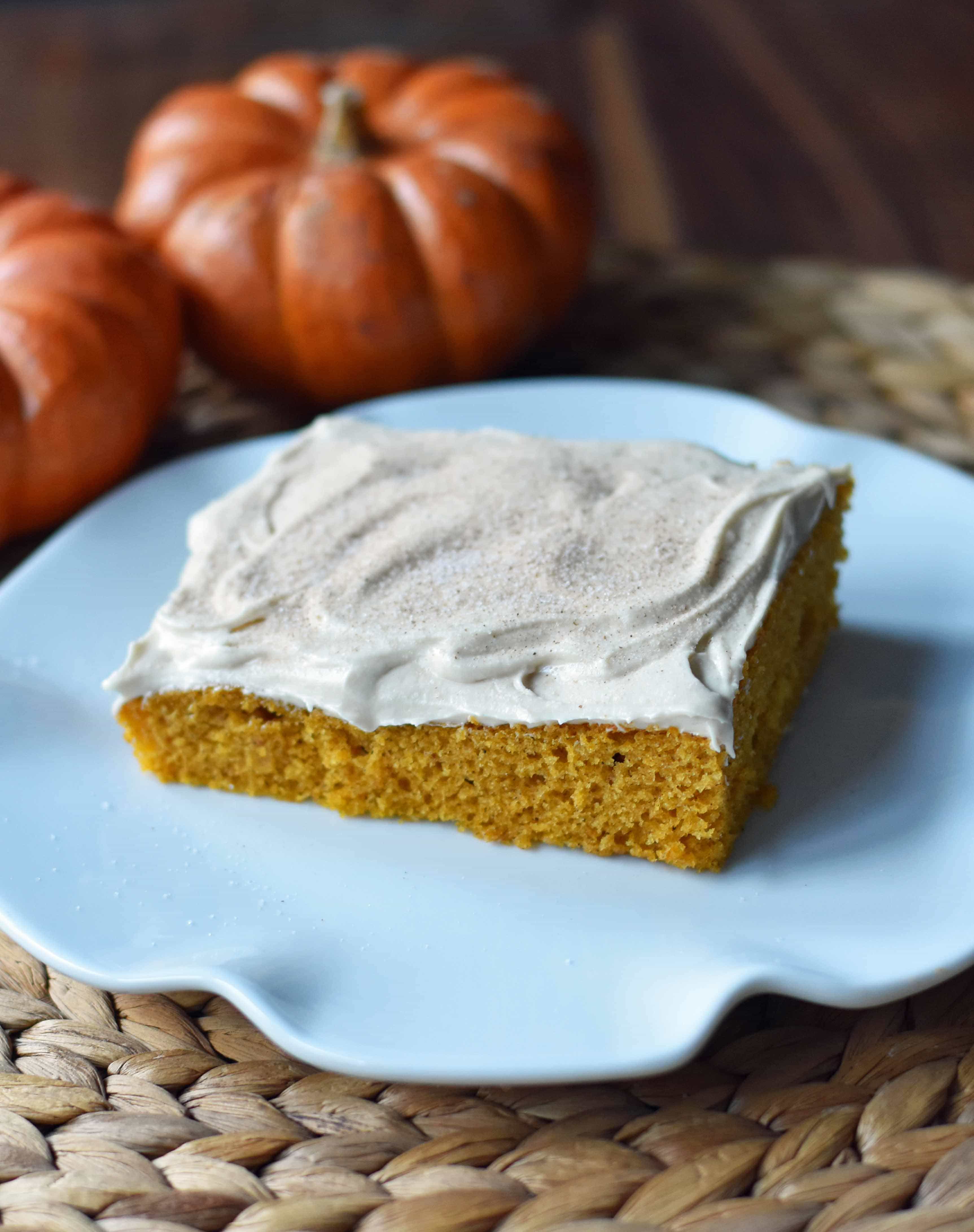 Pumpkin Sheet Cake with Cream Cheese Frosting. A pumpkin spice cake with a creamy homemade cream cheese frosting. A super simple, easy cake recipe! www.modernhoney.com