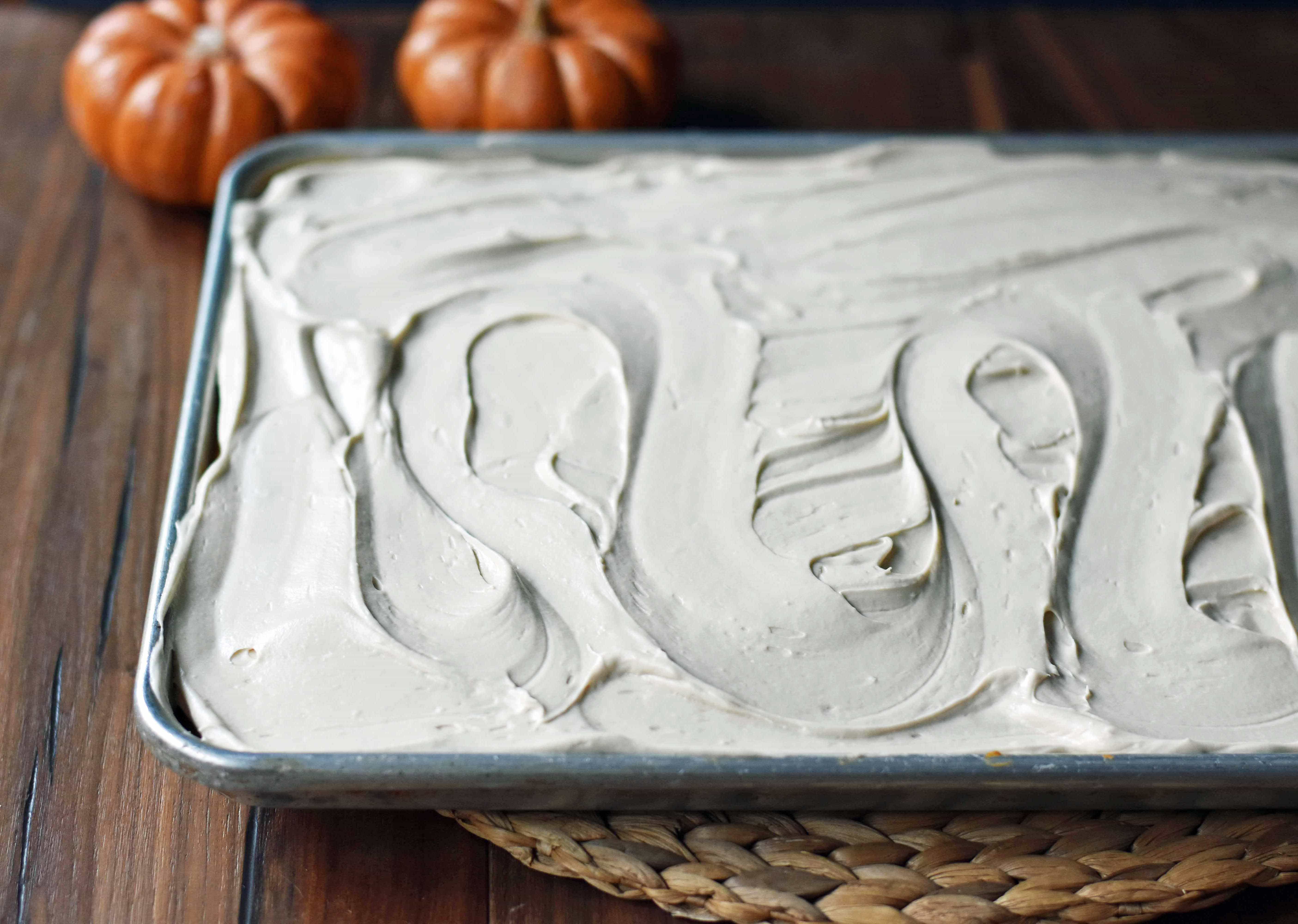 Pumpkin Sheet Cake with Cream Cheese Frosting. A pumpkin spice cake with a creamy homemade cream cheese frosting. A super simple, easy cake recipe! www.modernhoney.com