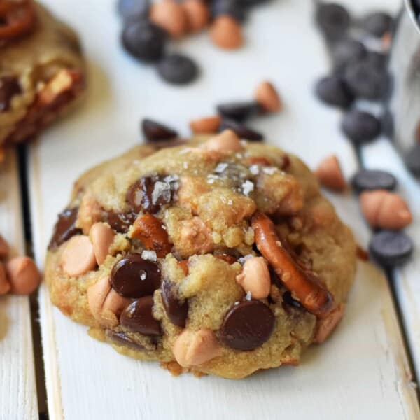 Sea Salt Butterscotch Pretzel Cookies are made with brown butter, sweet butterscotch chips, chocolate chips, and pretzels. The perfect sweet and salty cookie. A favorite cookie recipe! www.modernhoney.com