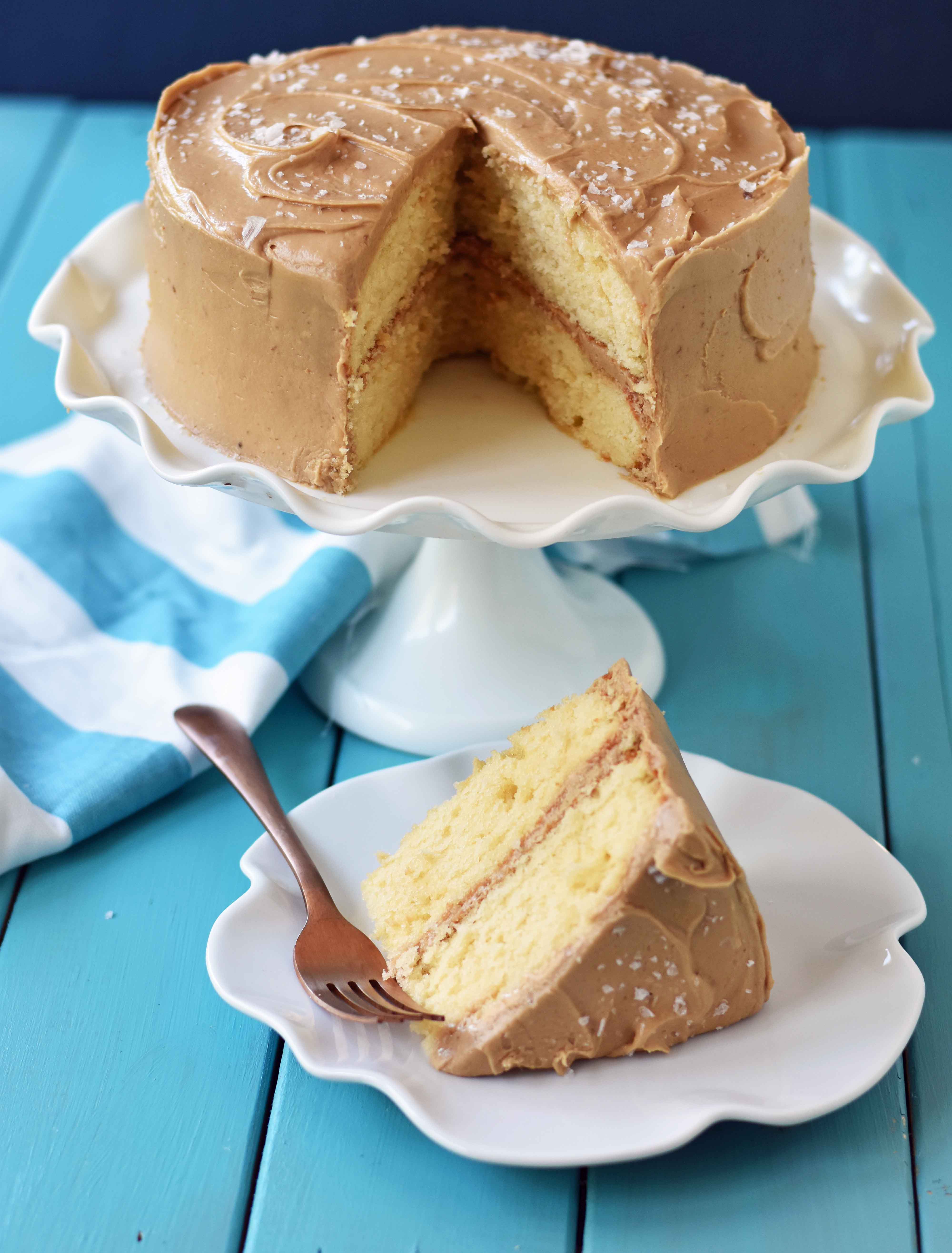 Southern Caramel Cake with Salted Caramel Frosting. A moist and fluffy yellow cake with sea salt caramel frosting. A Southern favorite cake! www.modernhoney.com