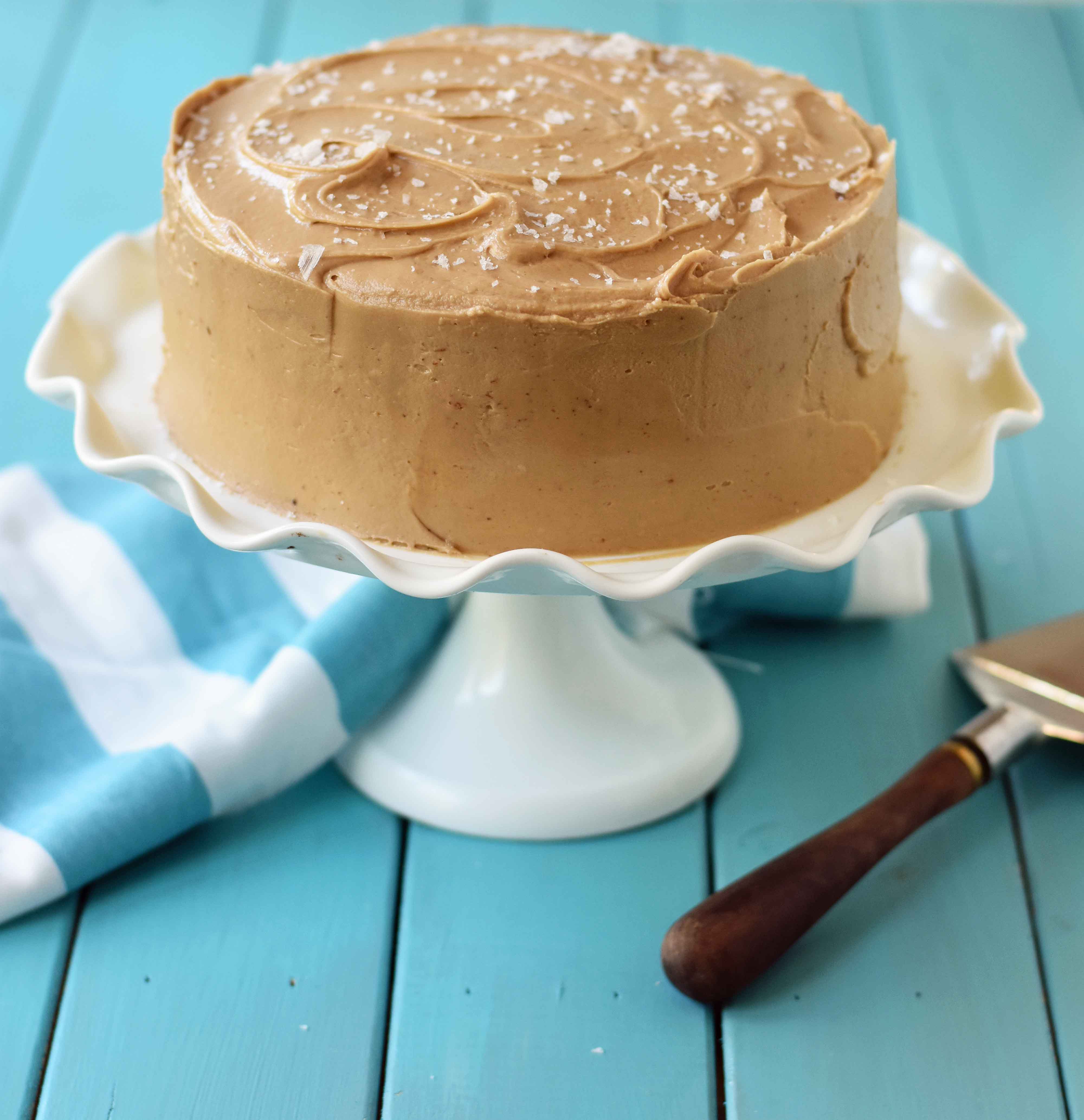 Southern Caramel Cake with Salted Caramel Frosting. A moist and fluffy yellow cake with sea salt caramel frosting. A Southern favorite cake! www.modernhoney.com