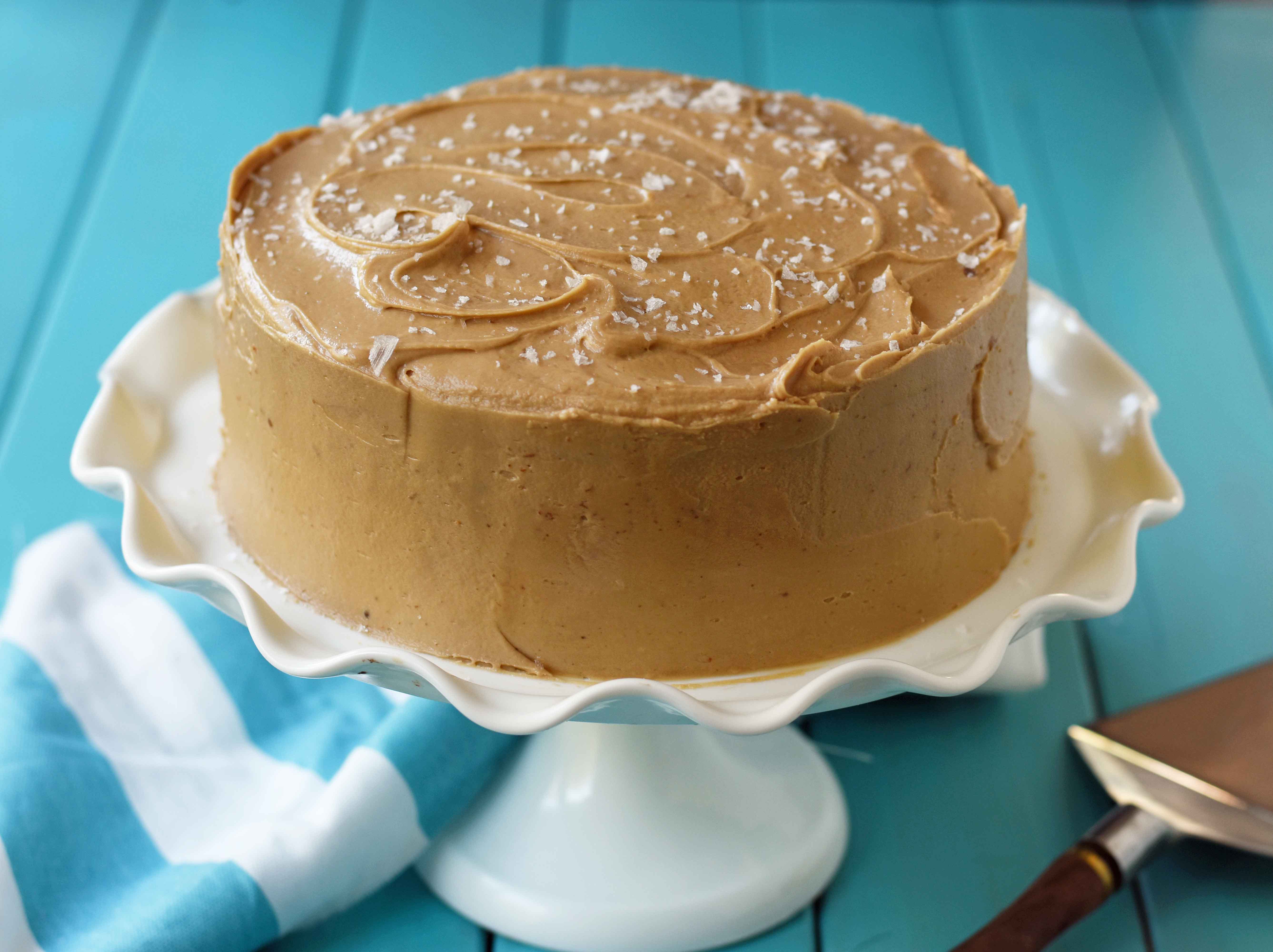 Southern Caramel Cake with Salted Caramel Frosting. A moist and fluffy yellow cake with sea salt caramel frosting. A Southern favorite cake! www.modernhoney.com