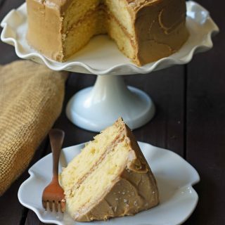 Southern Caramel Cake with Salted Caramel Frosting. A moist and fluffy yellow cake with sea salt caramel frosting. A Southern favorite cake! www.modernhoney.com