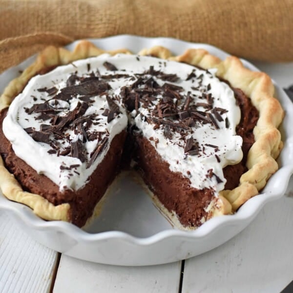 Chocolate Cream Pie. A homemade rich chocolate silk pie with a homemade chocolate custard. The best chocolate cream pie. www.modernhoney.com #chocolatecreampie #chocolatepie #pie #pierecipes #chocolate