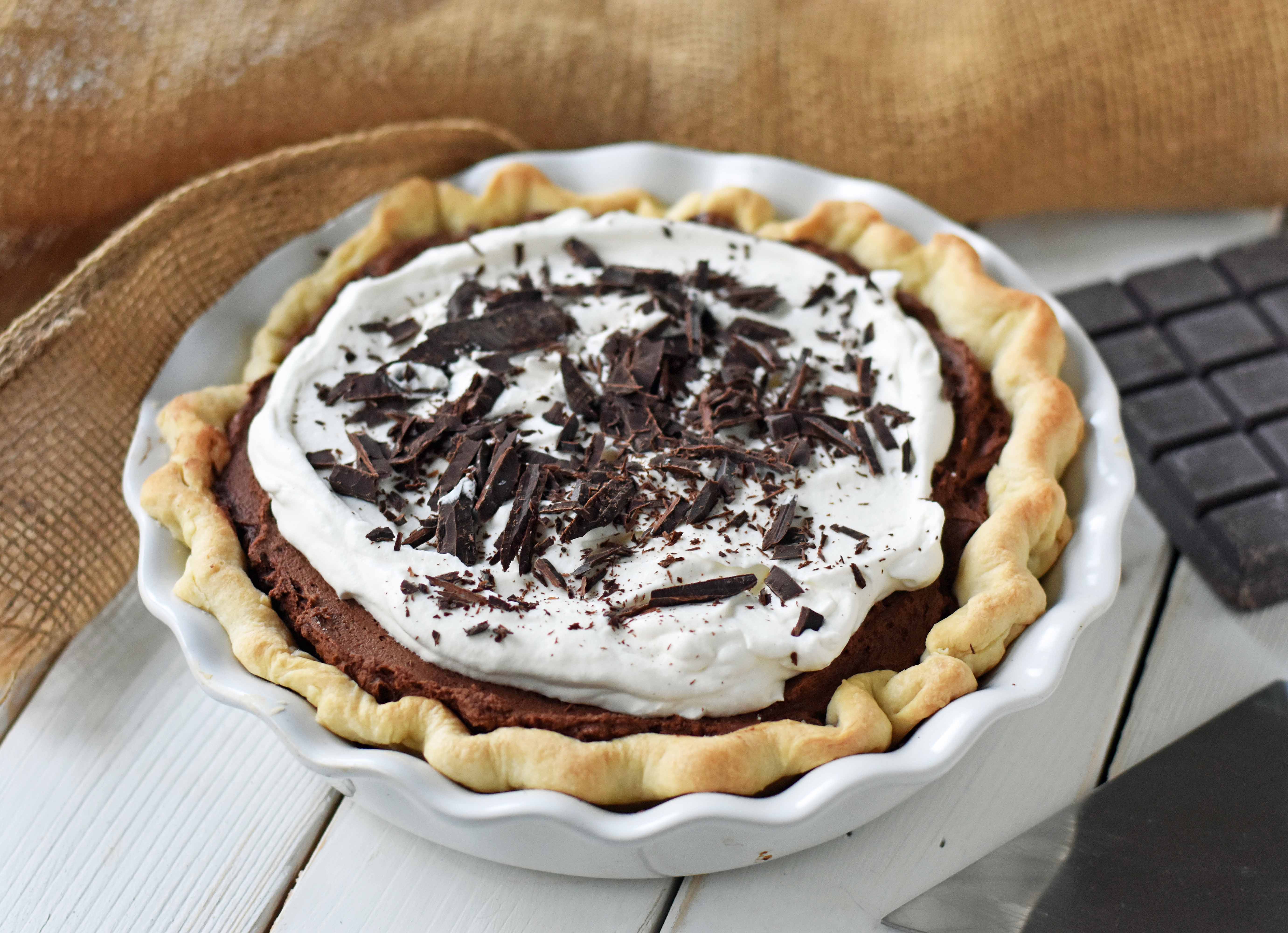 Chocolate Cream Pie. A homemade rich chocolate silk pie with a homemade chocolate custard. The best chocolate cream pie. www.modernhoney.com #chocolatecreampie #chocolatepie #pie #pierecipes #chocolate 