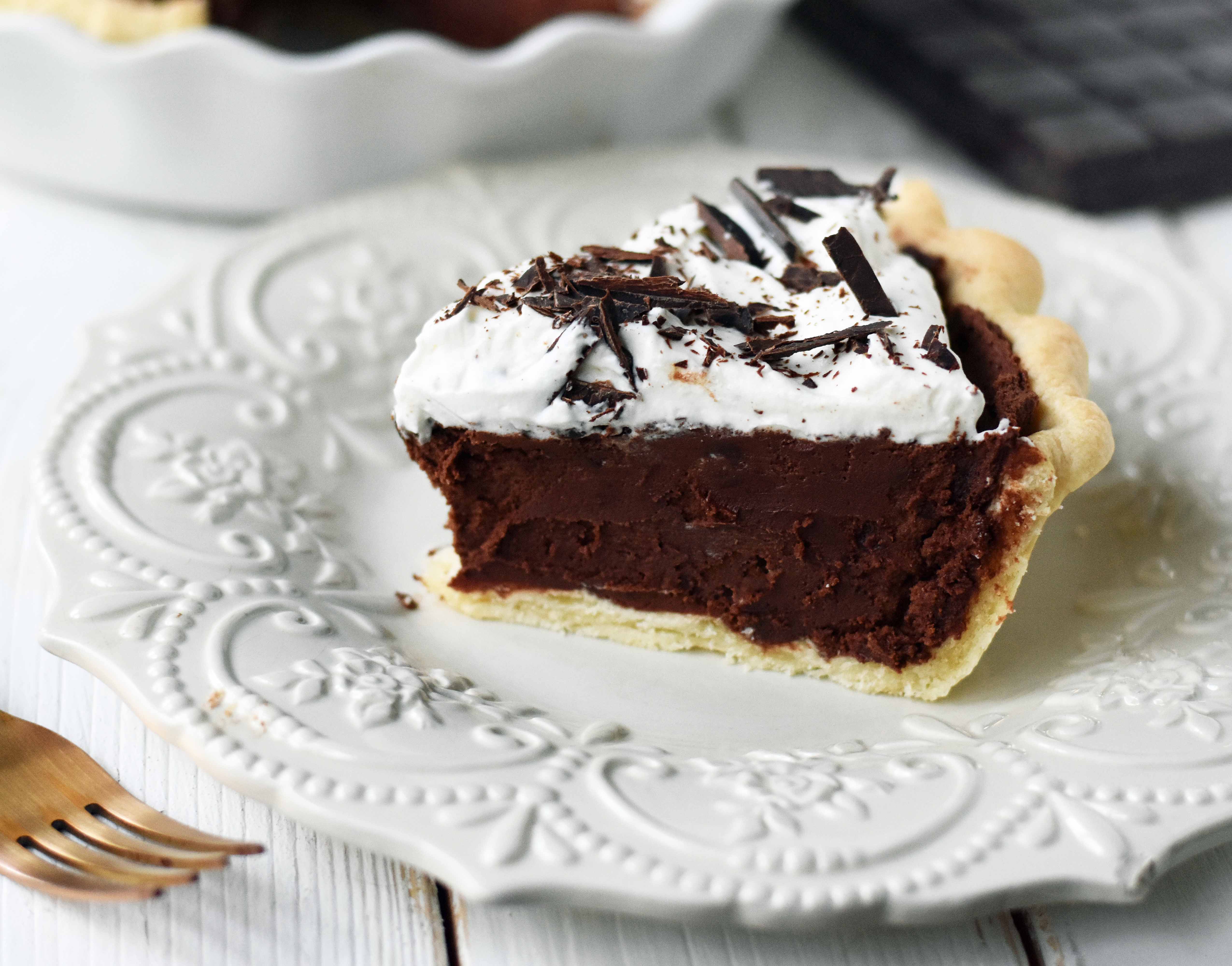 Chocolate Cream Pie. A homemade rich chocolate silk pie with a homemade chocolate custard. The best chocolate cream pie. www.modernhoney.com #chocolatecreampie #chocolatepie #pie #pierecipes #chocolate 