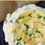 Creamy Parmesan Mashed Potatoes are the perfect mashed potatoes. Rich and creamy potatoes with butter, half-n-half, sour cream, and parmesan cheese. The most flavorful and creamy mashed potatoes! A popular side dish. www.modernhoney.com