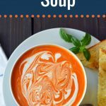 Creamy Tomato Basil Soup is the best cream of tomato soup. This Creamy Tomato Basil Soup Recipe using sauteed onions, garlic, tomatoes, chicken broth, basil, and heavy cream. You will never eat canned tomato soup again! The best creamy tomato soup recipe. www.modernhoney.com