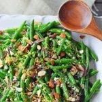 Green Beans with Almonds and Caramelized Onions. Light and fresh green beans sauteed with caramelized onions, fresh lemon zest, and crunchy almonds. Perfect side dish for your holiday table. www.modernhoney.com