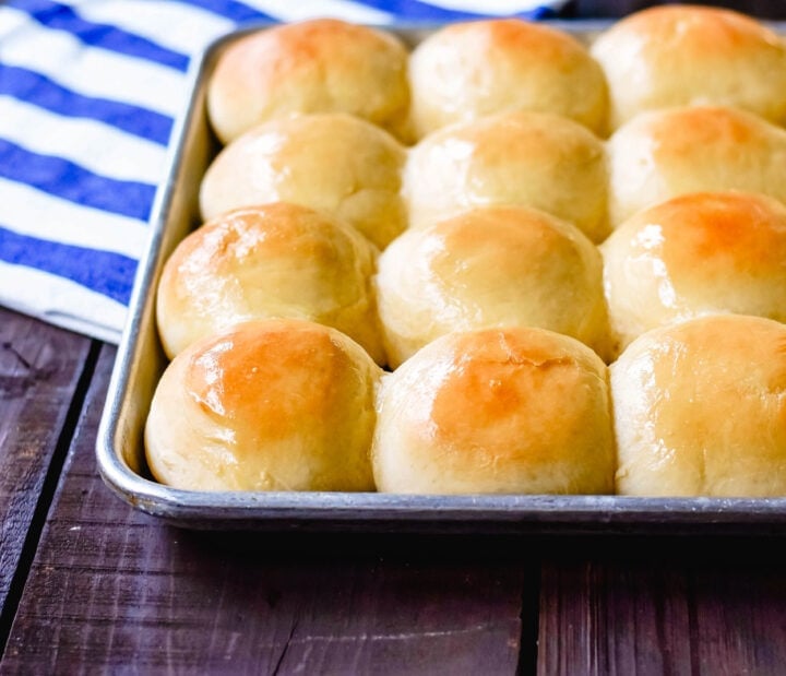 These Dinner Rolls are so light and fluffy and are the best homemade dinner rolls ever! These homemade rolls are made with only 8 ingredients and are so easy.