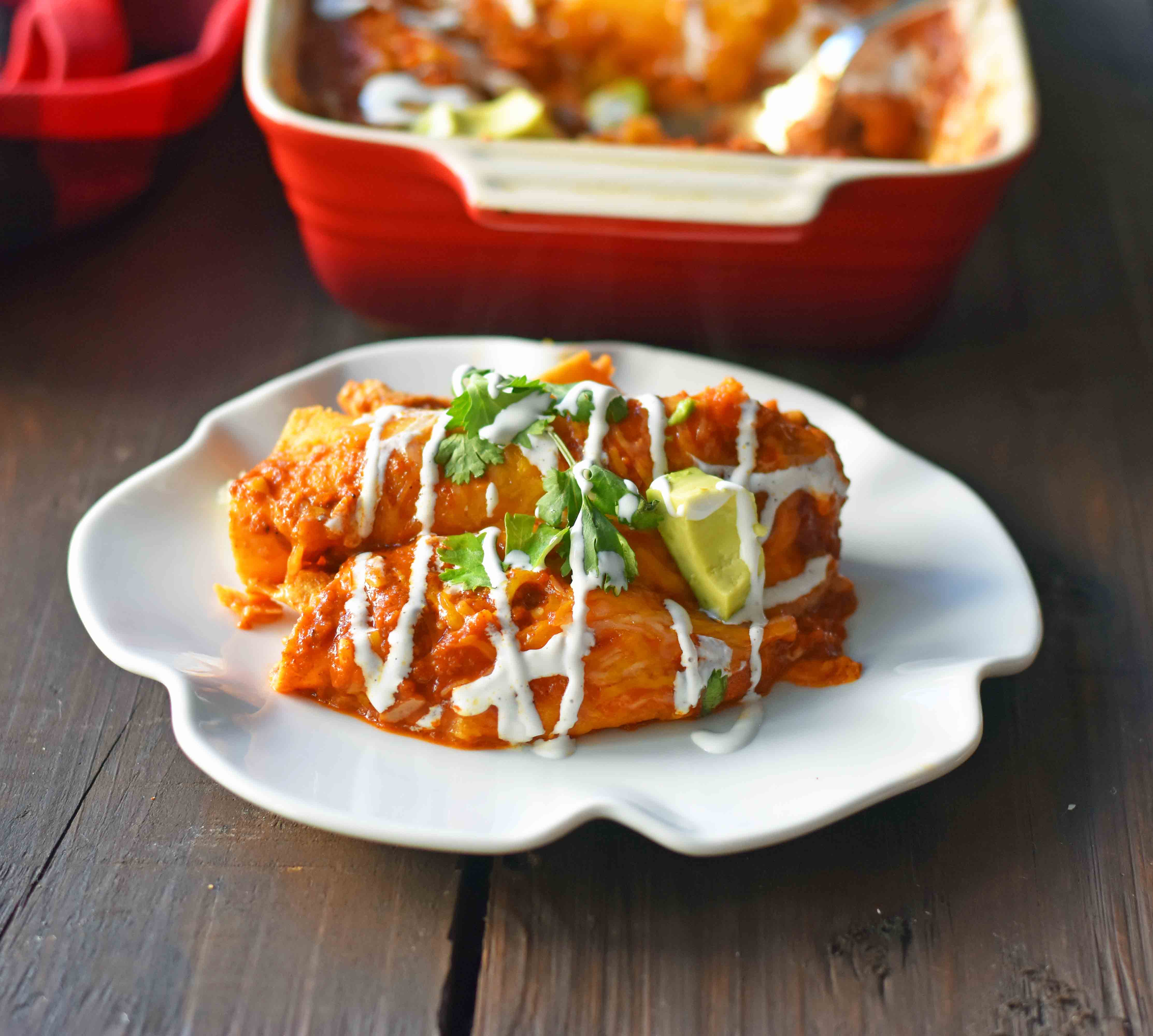 Red Chile Chicken Enchiladas with homemade red enchilada sauce. How to make enchilada sauce from scratch. The best red chicken and cheese enchiladas. www.modernhoney.com