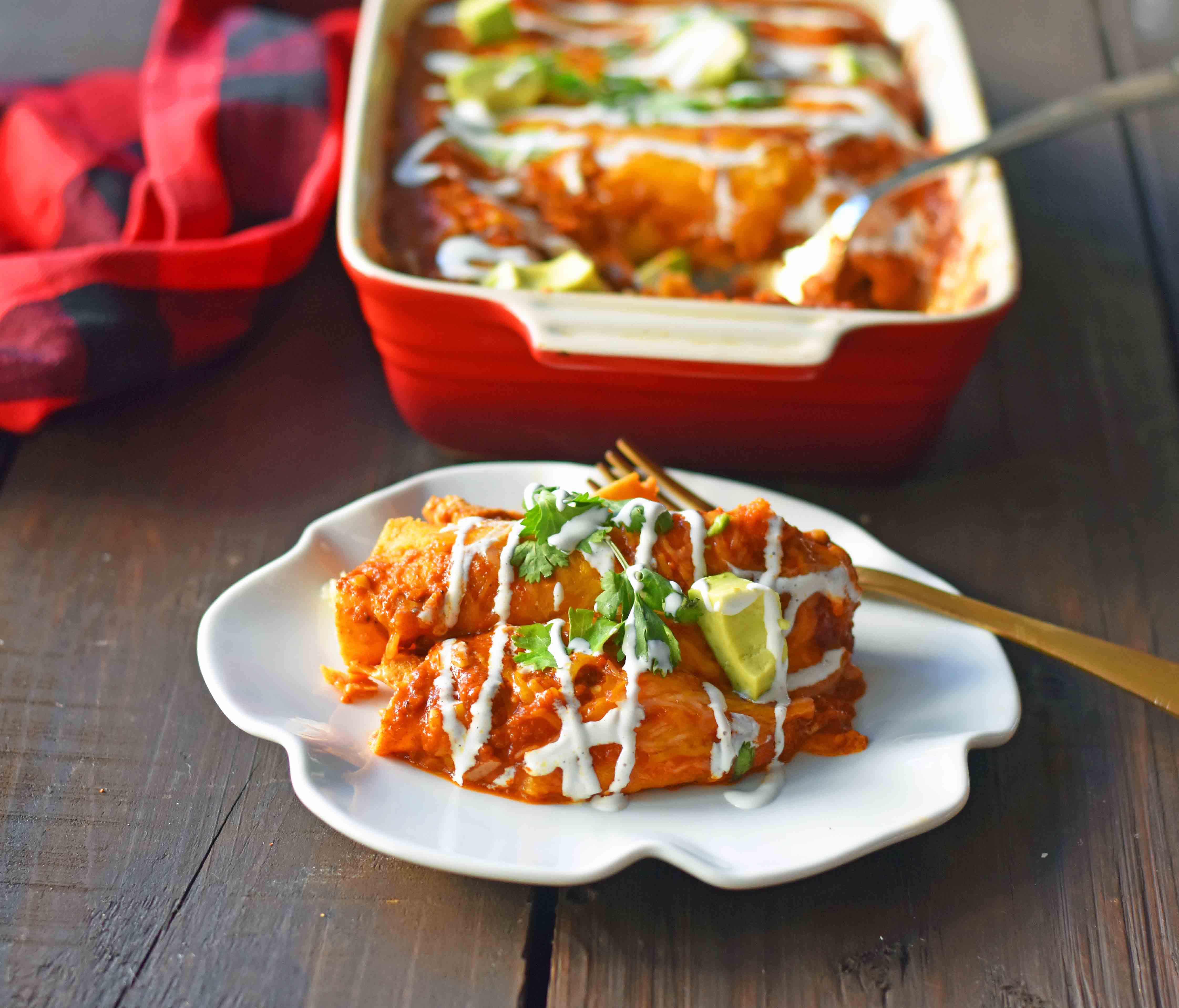 Red Chile Chicken Enchiladas with homemade red enchilada sauce. How to make enchilada sauce from scratch. The best red chicken and cheese enchiladas. www.modernhoney.com