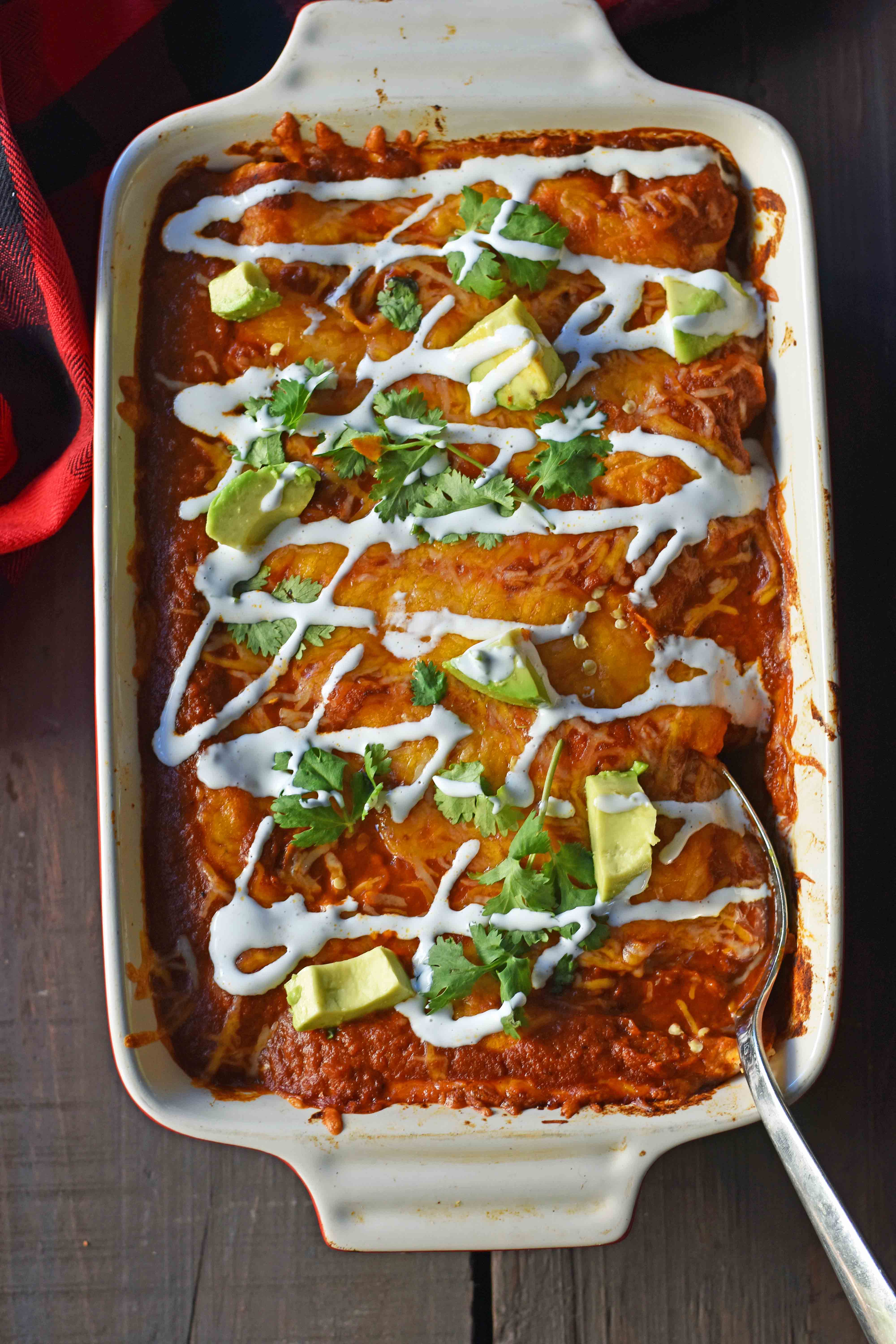 Red Chile Chicken Enchiladas with homemade red enchilada sauce. How to make enchilada sauce from scratch. The best red chicken and cheese enchiladas. www.modernhoney.com