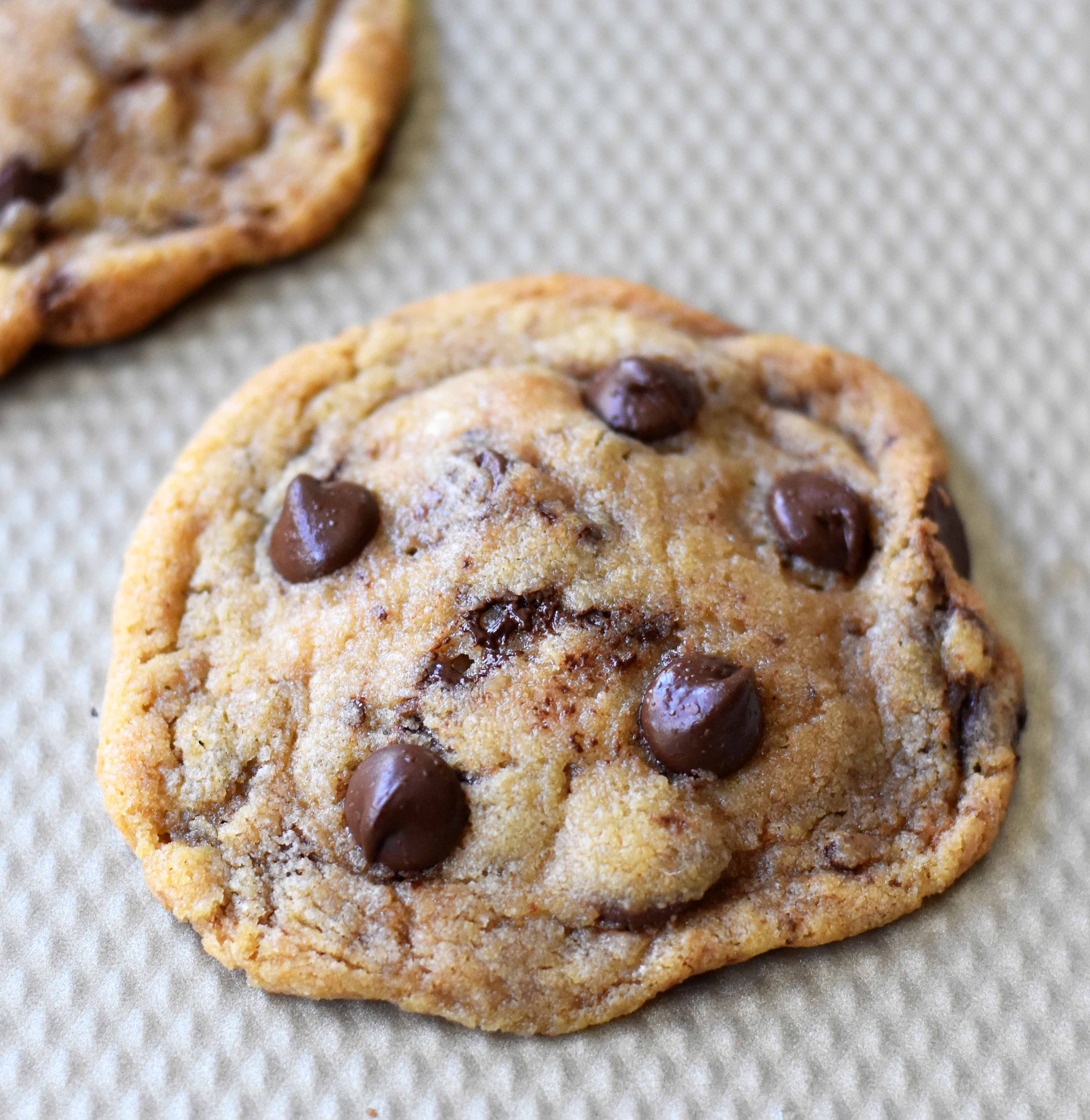 Thin and Crispy Chocolate Chip Cookies. How to make a perfect thin and chewy chocolate chip cookie. Brown butter chocolate chip cookie recipe. A perfect thin and chewy chocolate chip cookie. www.modernhoney.com