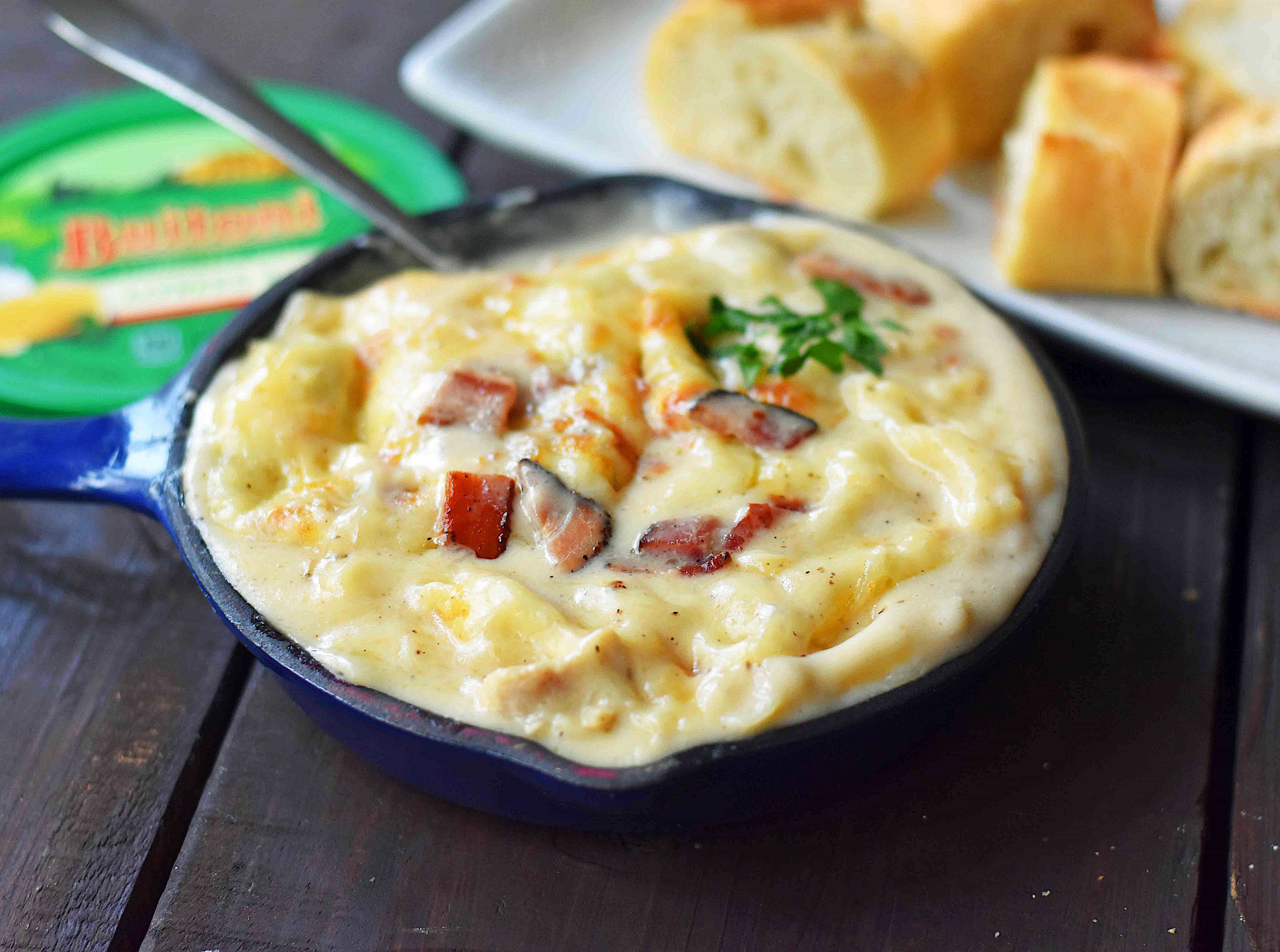 Chicken Bacon Alfredo Dip with Sautéed Chicken, Buitoni Alfredo Sauce, Crispy Bacon and baked with Mozzarella and Buitoni Parmesan Cheese. Served with sliced French Bread. A savory and cheese-filled baked appetizer that will please the masses!