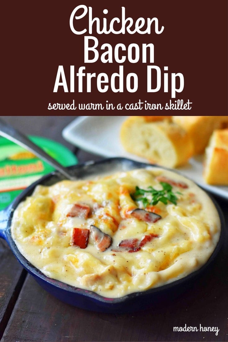 Chicken Bacon Alfredo Dip with Sautéed Chicken, Buitoni Alfredo Sauce, Crispy Bacon and baked with Mozzarella and Buitoni Parmesan Cheese. Served with sliced French Bread. A savory and cheese-filled baked appetizer that will please the masses! www.modernhoney.com