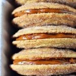 Dulce de Leche Cinnamon Sandwich Cookies. Cinnamon sugar snickerdoodles cookies stuffed with buttery dulce de leche caramel. A cinnamon sugar caramel cookie. www.modernhoney.com