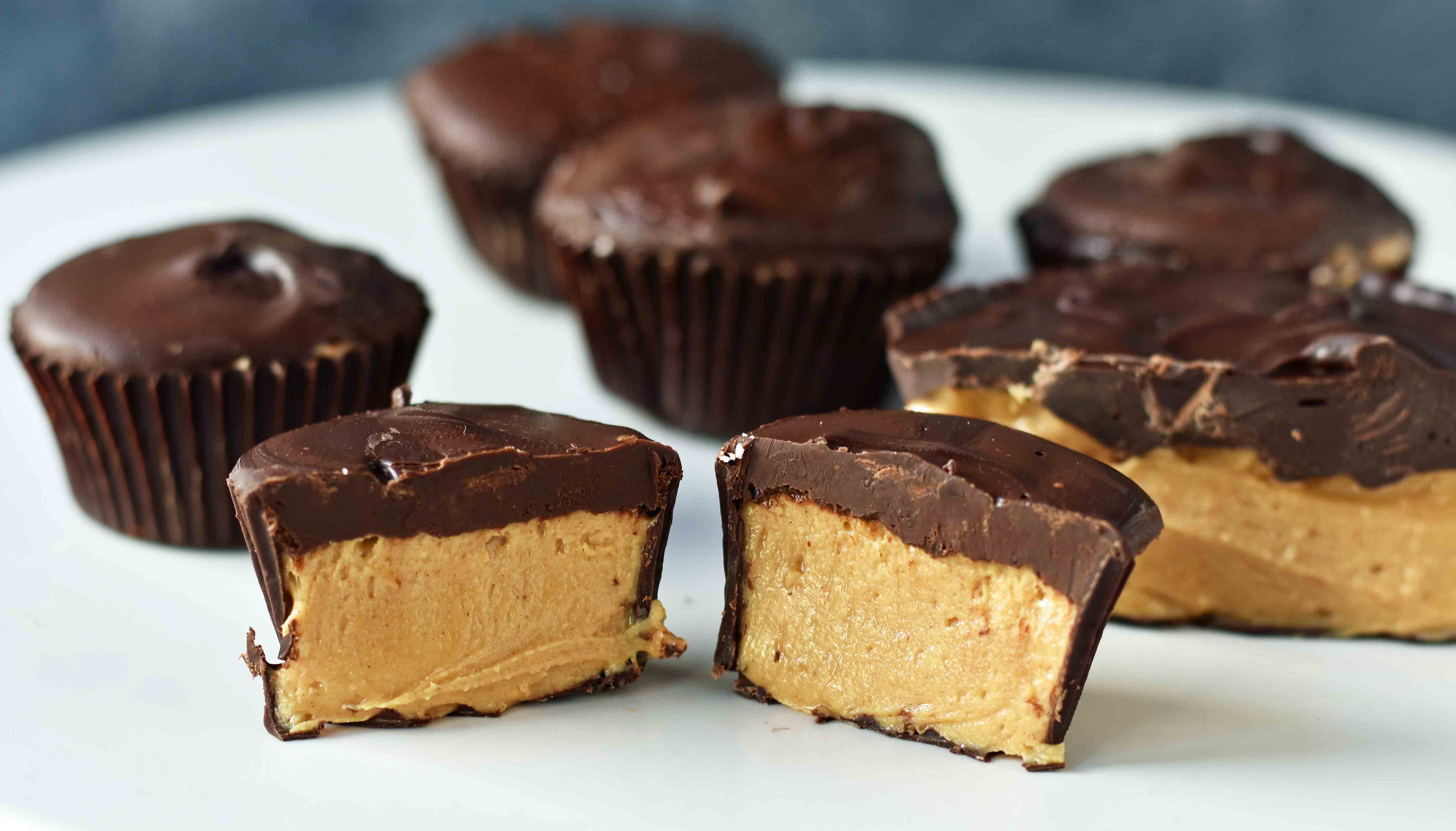 Homemade Chocolate Peanut Butter Cups. How to make copycat Reese's chocolate chip peanut butter cups and copycat Trader Joe's peanut butter cups. The best homemade chocolate peanut butter cups recipe. www.modernhoney.com