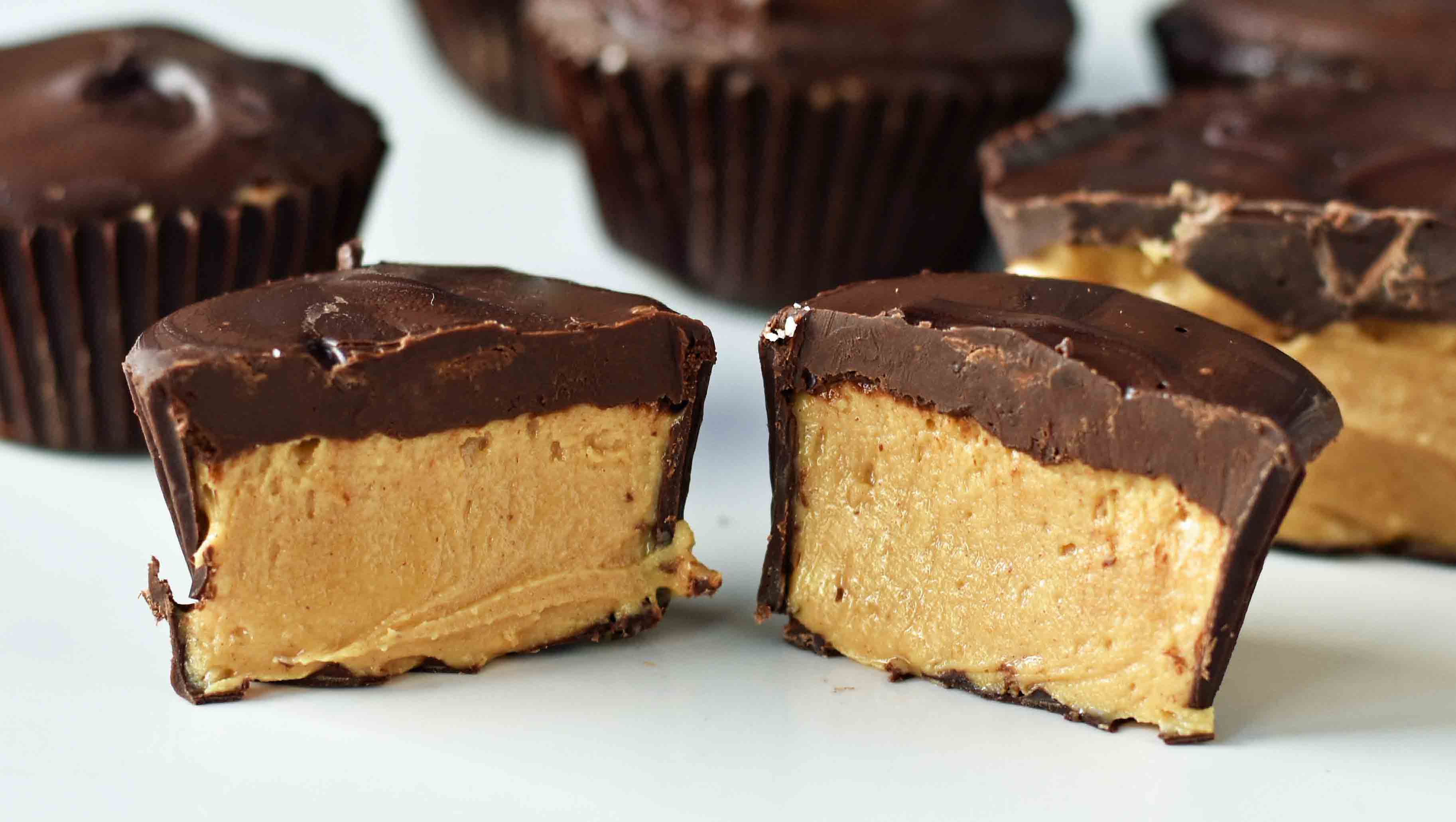 Homemade Chocolate Peanut Butter Cups. How to make copycat Reese's chocolate chip peanut butter cups and copycat Trader Joe's peanut butter cups. The best homemade chocolate peanut butter cups recipe. www.modernhoney.com