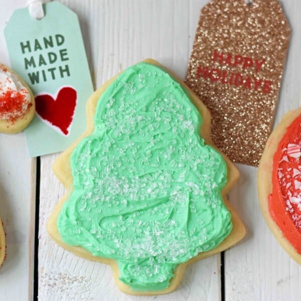 Soft Sugar Christmas Cookies. How to make the best sugar cookies with buttercream frosting. Sugar cookies with secret ingredient. Christmas Sugar Cookies Recipe. www.modernhoney.com