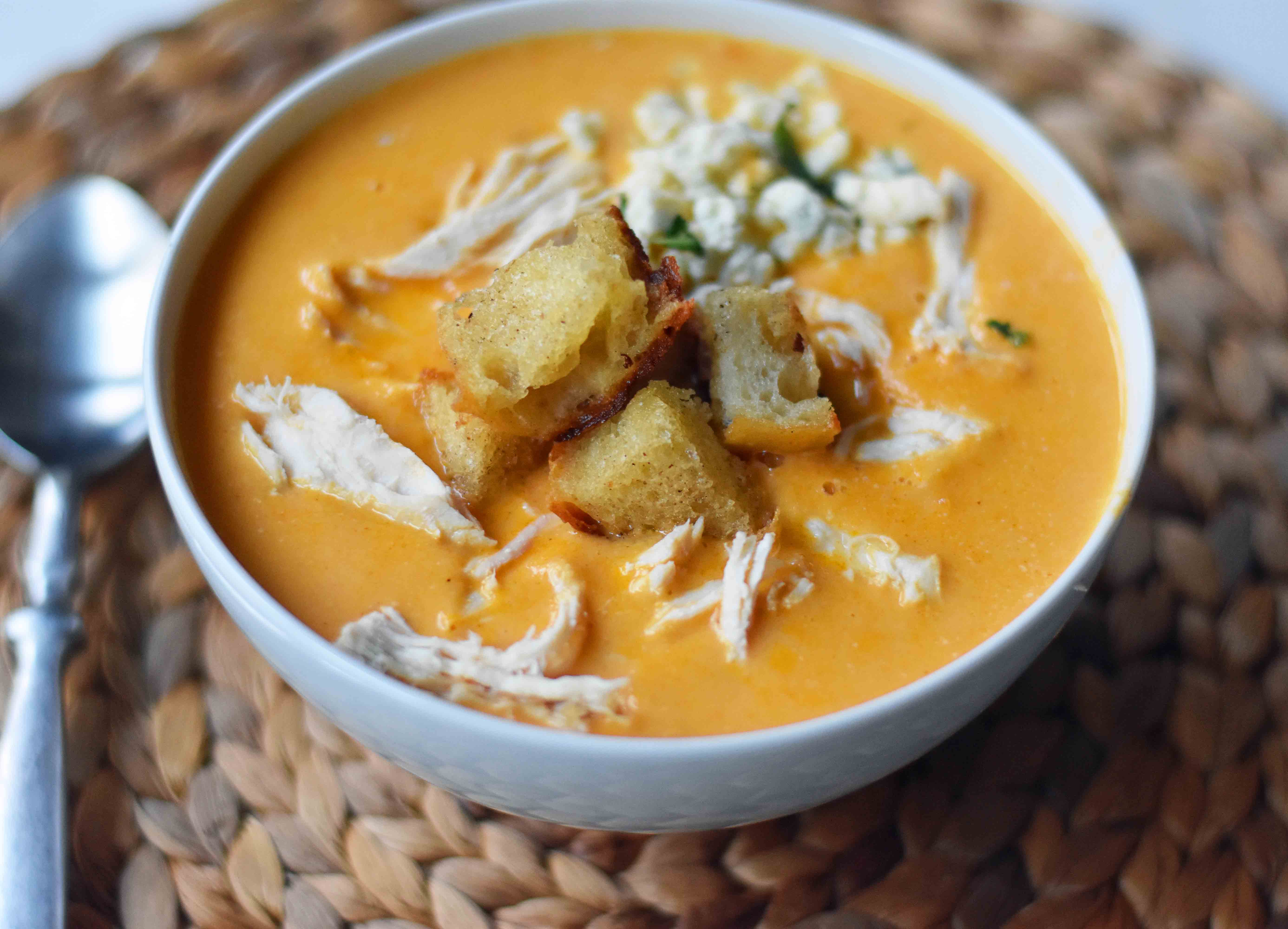 Creamy Buffalo Chicken Soup. All of the flavor of chicken wings in one soup. A tangy, creamy, and spicy buffalo chicken soup. www.modernhoney.com