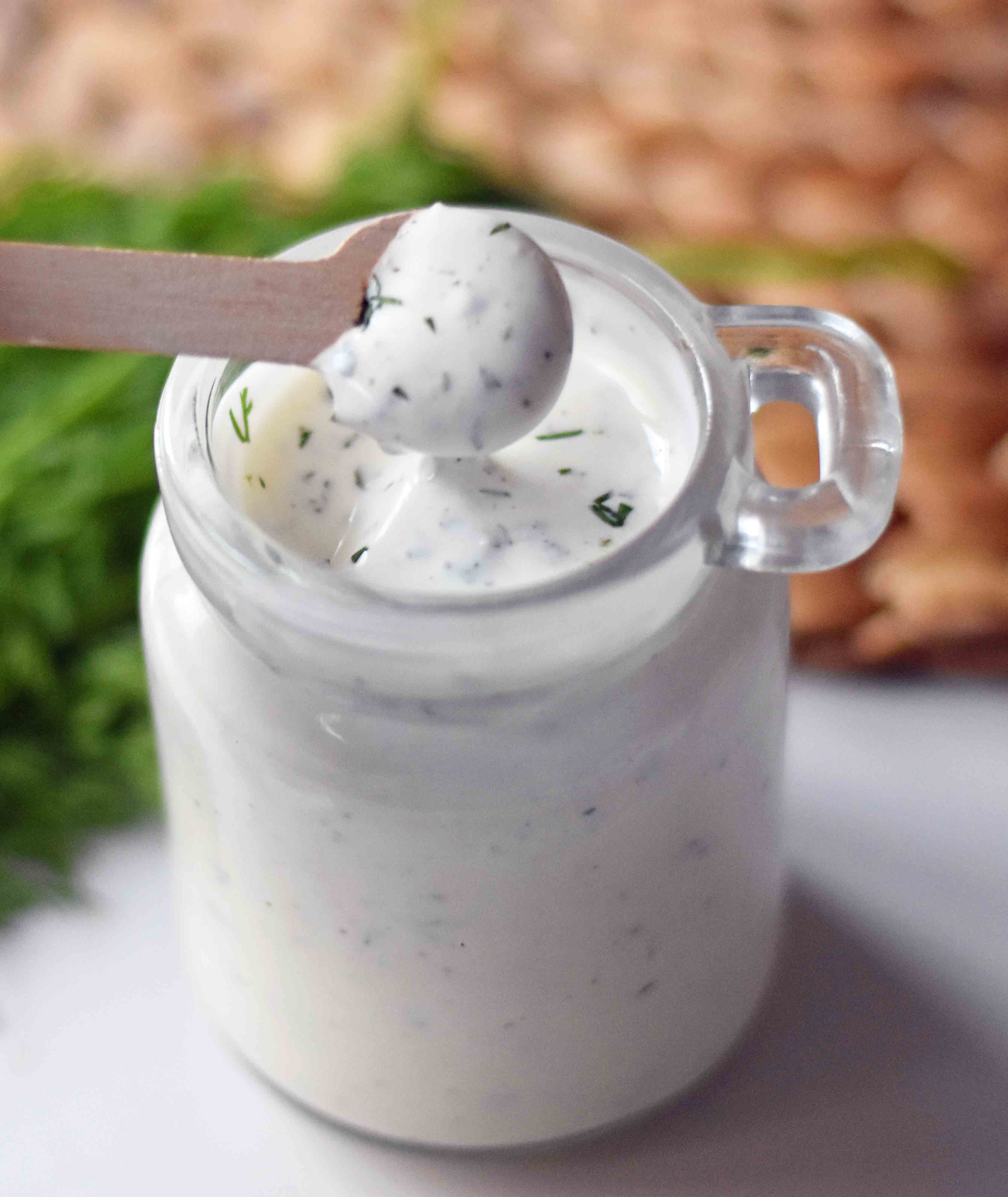 Homemade Ranch Dressing made with fresh herbs is way better than what you find in the store. A combination of mayonnaise, buttermilk, and sour cream with all kinds of herbs and spices makes this the perfect ranch dressing recipe. www.modernhoney.com