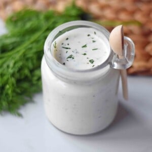 Homemade Ranch Dressing made with fresh herbs is way better than what you find in the store. A combination of mayonnaise, buttermilk, and sour cream with all kinds of herbs and spices makes this the perfect ranch dressing recipe. www.modernhoney.com