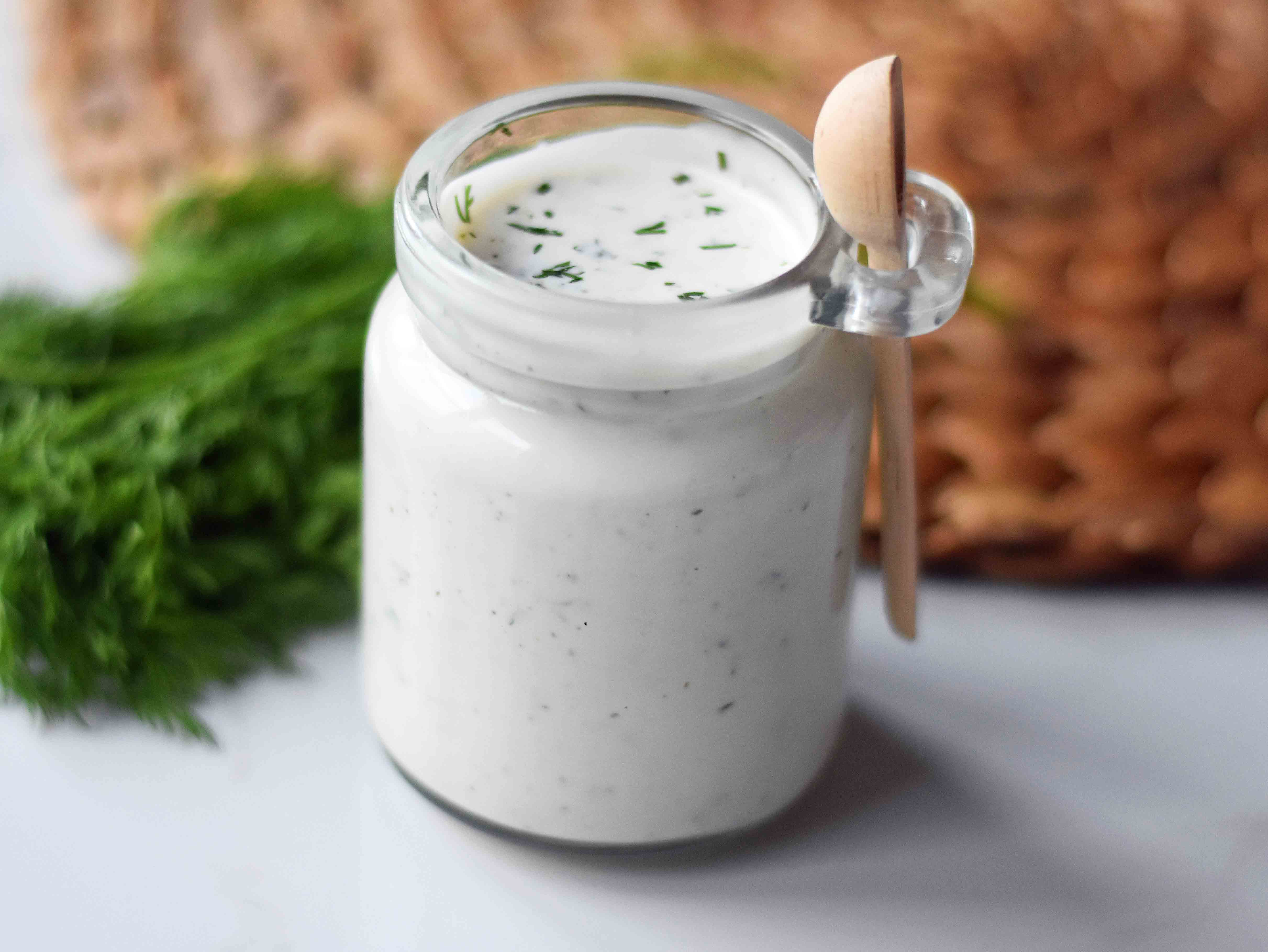 Homemade Ranch Dressing made with fresh herbs is way better than what you find in the store. A combination of mayonnaise, buttermilk, and sour cream with all kinds of herbs and spices makes this the perfect ranch dressing recipe. www.modernhoney.com