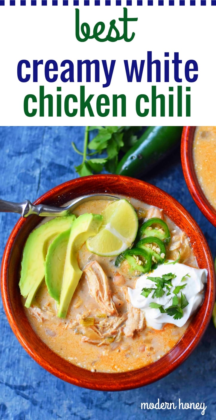 A creamy white bean chicken chili made with tender shredded chicken, green chilies, white beans, jalapeno, chicken broth, Mexican spices, and cream cheese. The BEST White Chicken Chili Recipe. Slow Cooker Crockpot White Bean Chicken Chili. Quick and easy White Chicken Chili Recipe. www.modernhoney.com