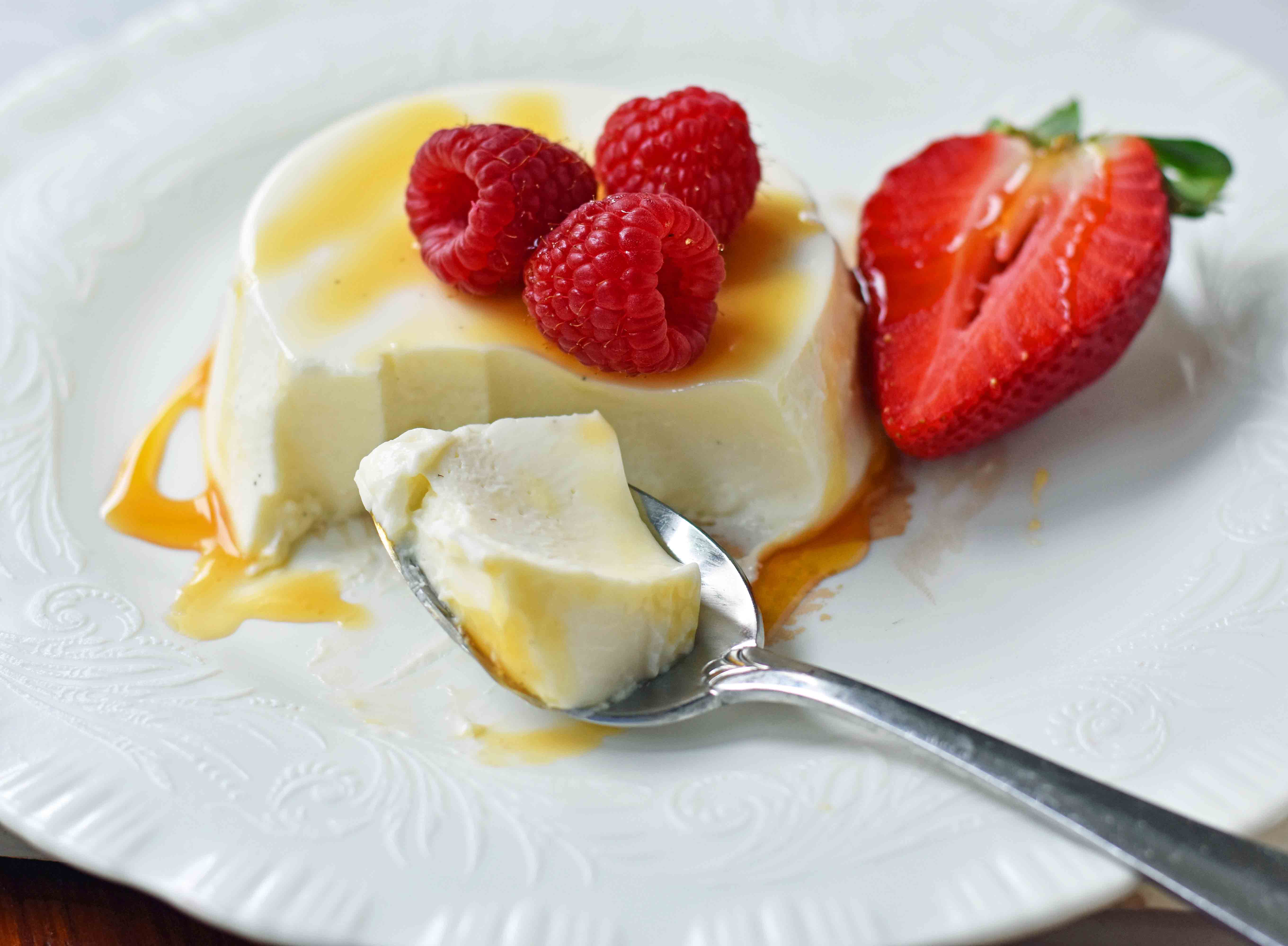 Greek Yogurt Panna Cotta. An easy panna cotta recipe made with greek yogurt, cream, sugar, honey, gelatin and vanilla bean. A silky smooth, creamy dessert that can be topped with fresh fruits, honey, caramel, berry compote or sauce, or anything you can dream up. The perfect panna cotta recipe. www.modernhoney.com