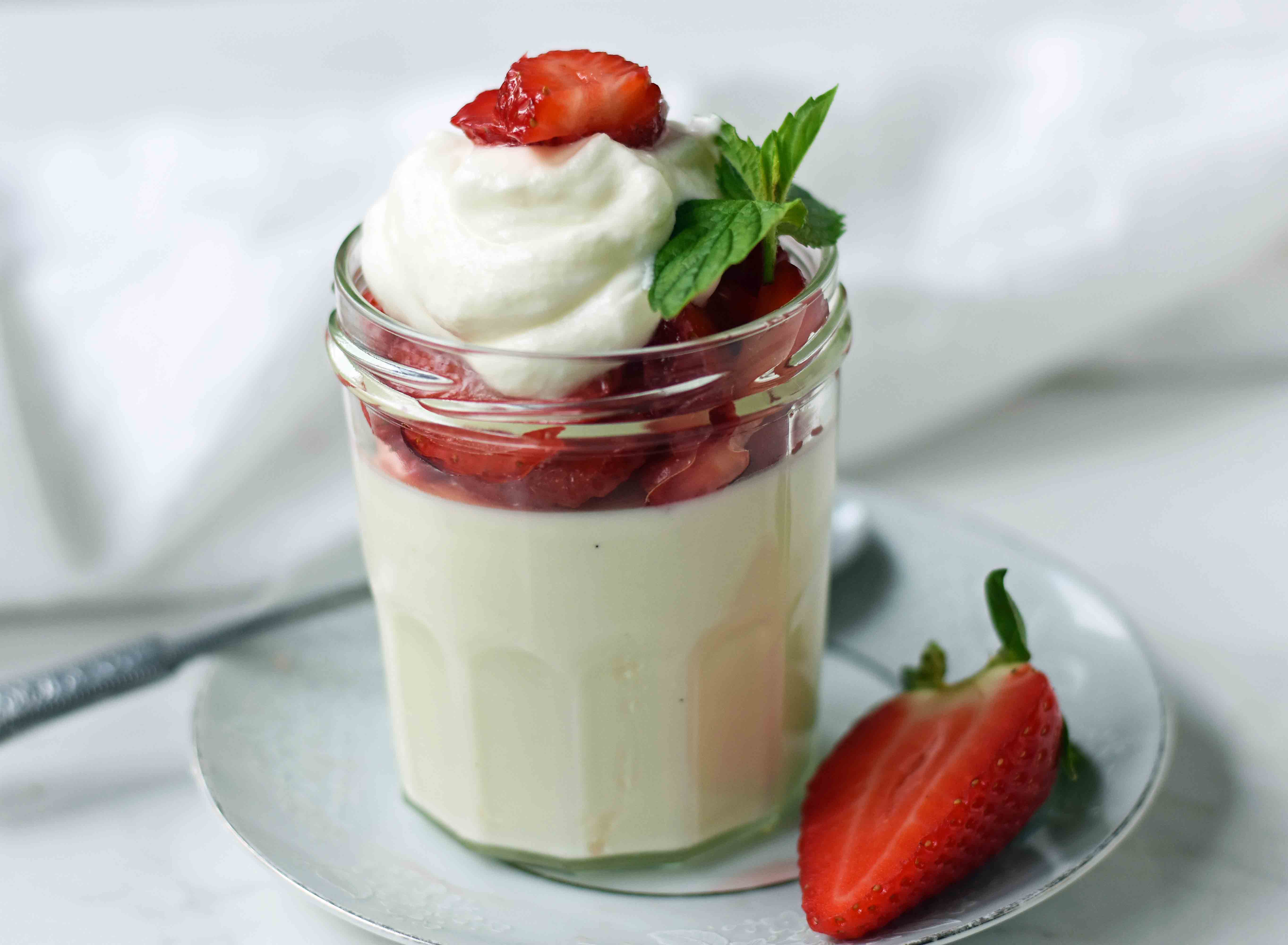 Greek Yogurt Panna Cotta. An easy panna cotta recipe made with greek yogurt, cream, sugar, honey, gelatin and vanilla bean. A silky smooth, creamy dessert that can be topped with fresh fruits, honey, caramel, berry compote or sauce, or anything you can dream up. The perfect panna cotta recipe. www.modernhoney.com