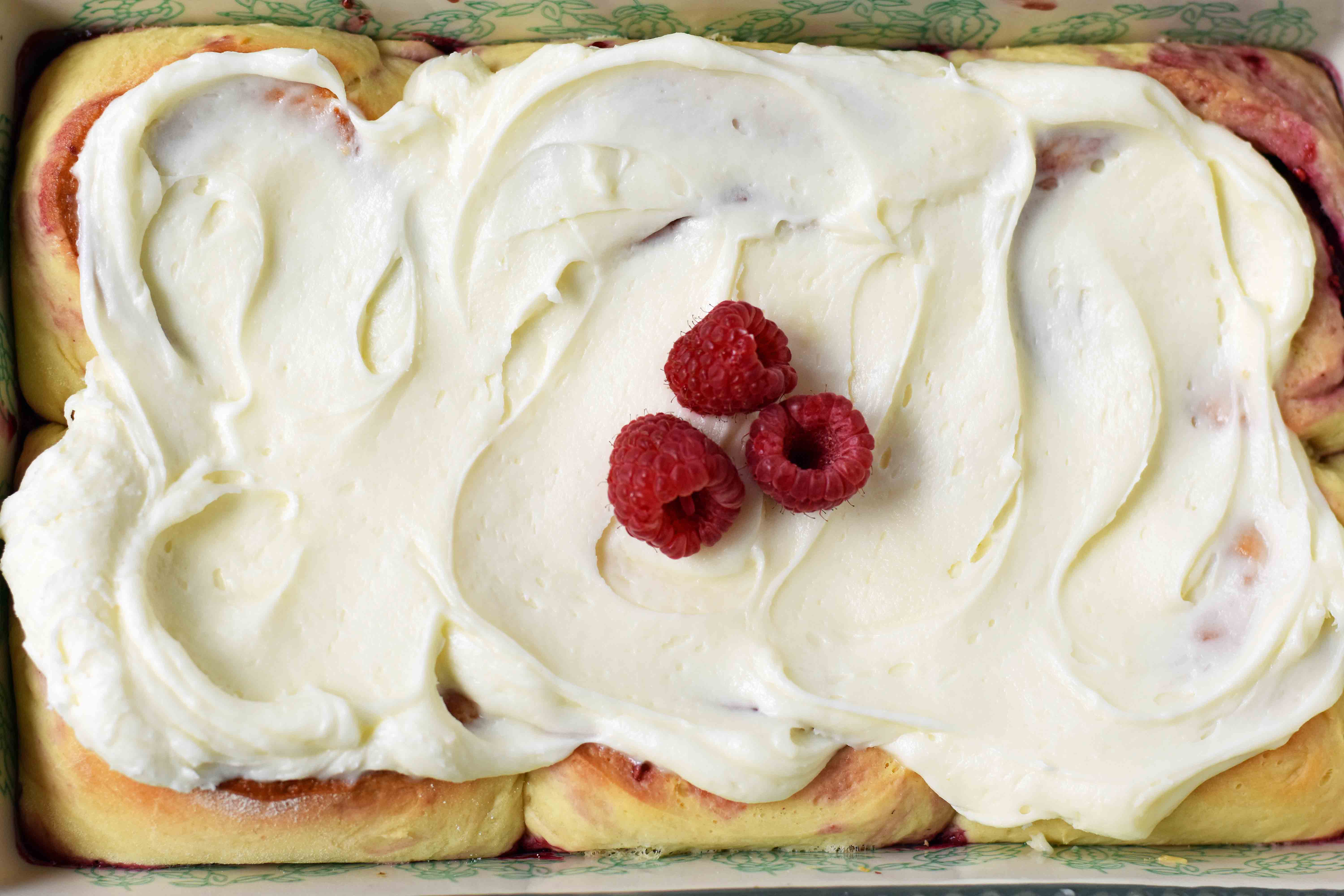 Raspberry Sweet Rolls with Cream Cheese Frosting. The best homemade raspberry rolls with cream cheese icing. How to make the best sweet rolls. www.modernhoney.com