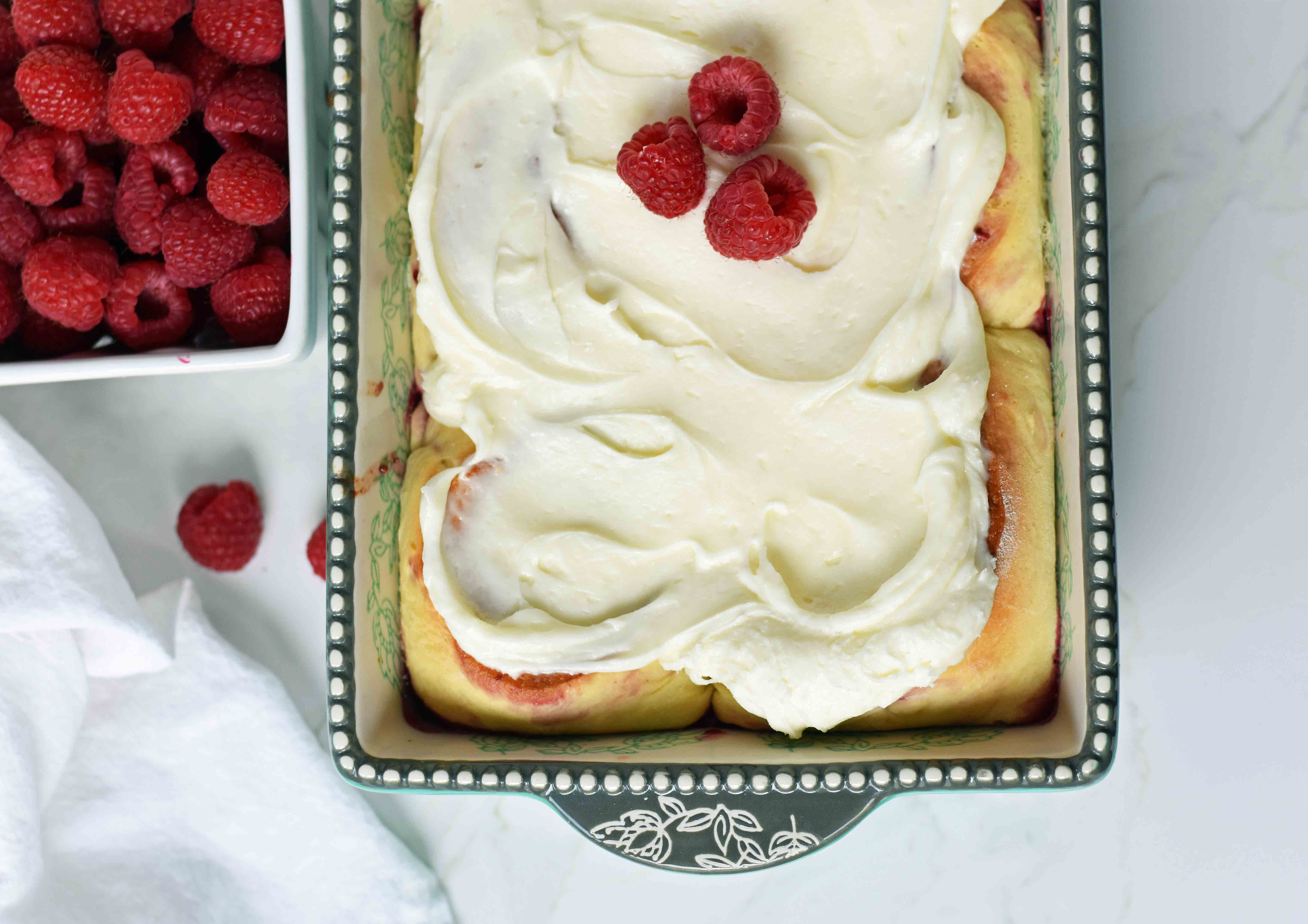 Raspberry Sweet Rolls with Cream Cheese Frosting. The best homemade raspberry rolls with cream cheese icing. How to make the best sweet rolls. www.modernhoney.com