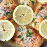 This simple 20-minute Skillet Lemon Butter Chicken is a pan-fried chicken in a silky lemon butter sauce. Chicken sauteed in butter and olive oil and topped with a creamy lemon butter sauce. An easy weeknight dinner that your whole family will love! www.modernhoney.com