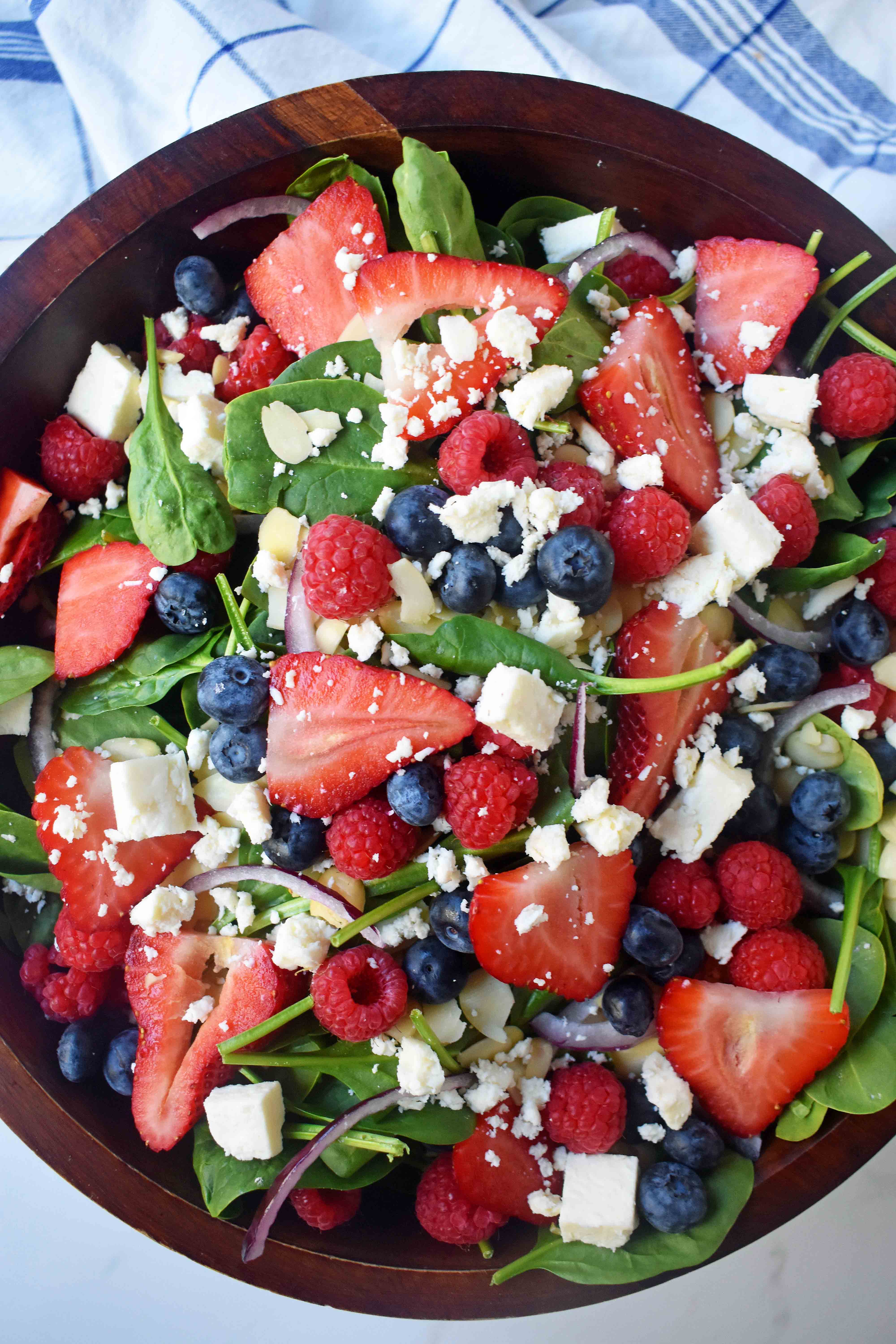 Spinach Berry Salad with Sweet Poppyseed Dressing. Fresh Spinach Salad with Berries, Feta Cheese, and Poppy Seed Dressing. www.modernhoney.com