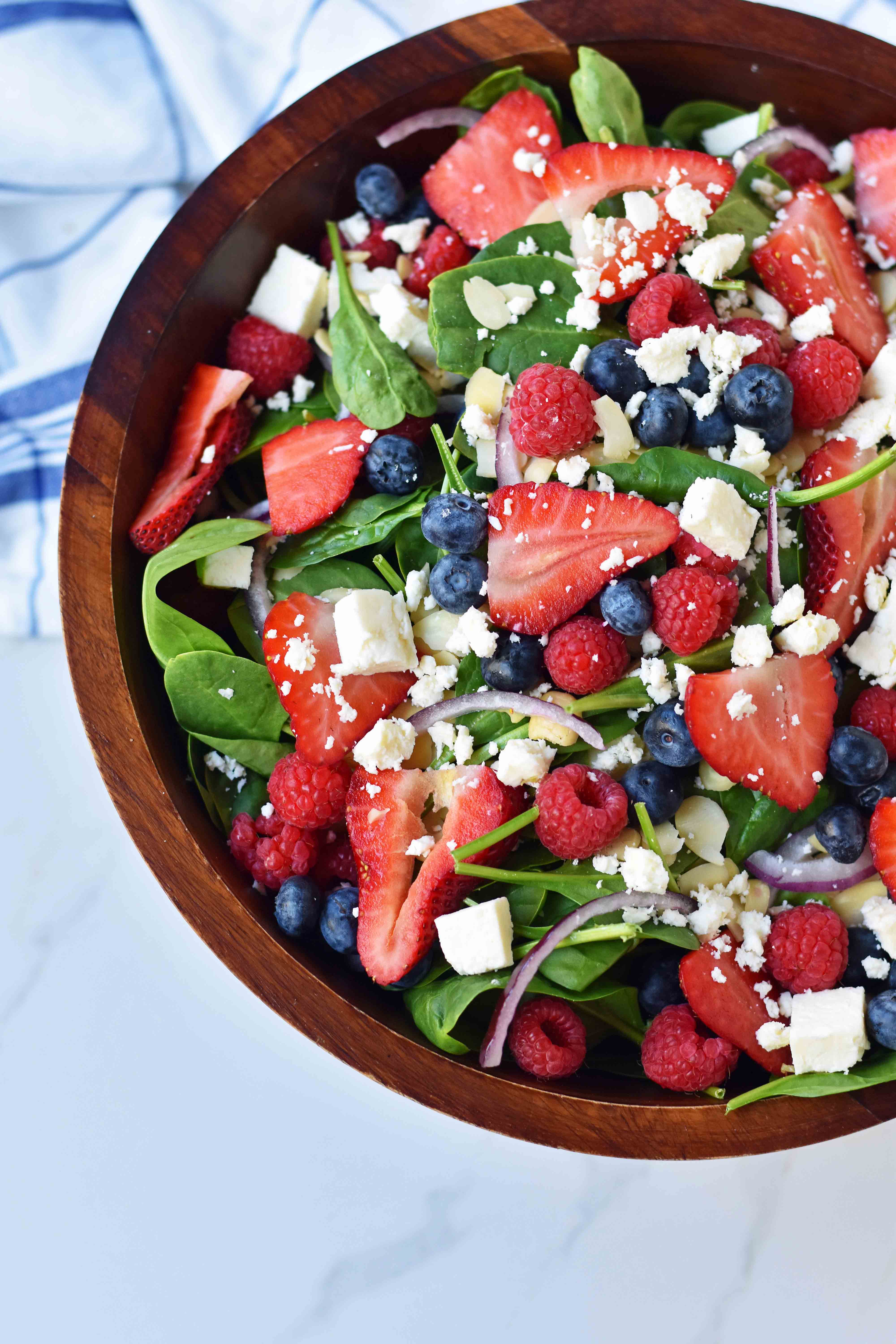 Spinach Berry Salad with Sweet Poppyseed Dressing. Fresh Spinach Salad with Berries, Feta Cheese, and Poppy Seed Dressing. www.modernhoney.com