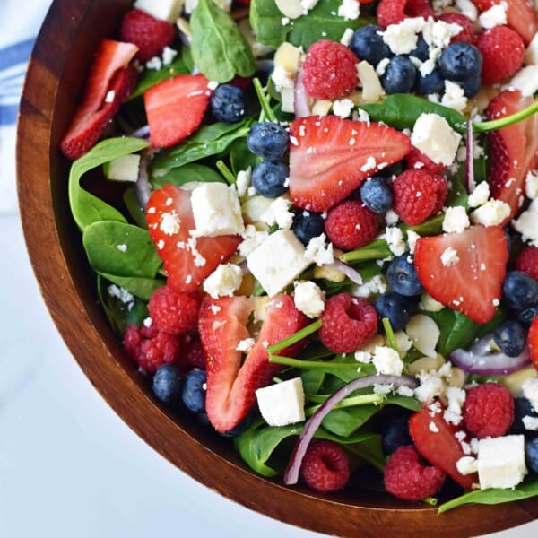 Spinach Berry Salad with Sweet Poppyseed Dressing. Fresh Spinach Salad with Berries, Feta Cheese, and Poppy Seed Dressing. www.modernhoney.com