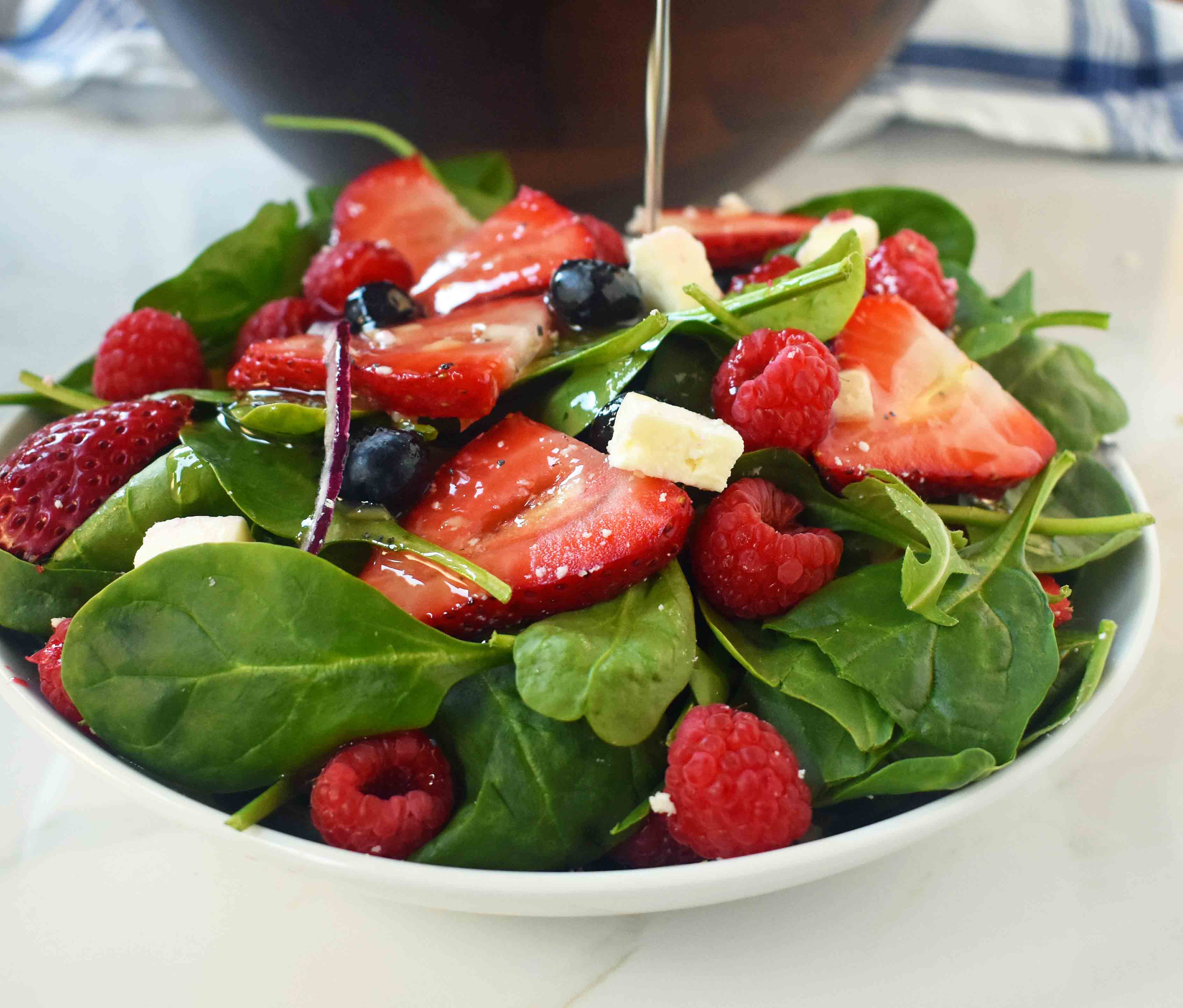 Spinach Berry Salad with Sweet Poppyseed Dressing. Fresh Spinach Salad with Berries, Feta Cheese, and Poppy Seed Dressing. www.modernhoney.com