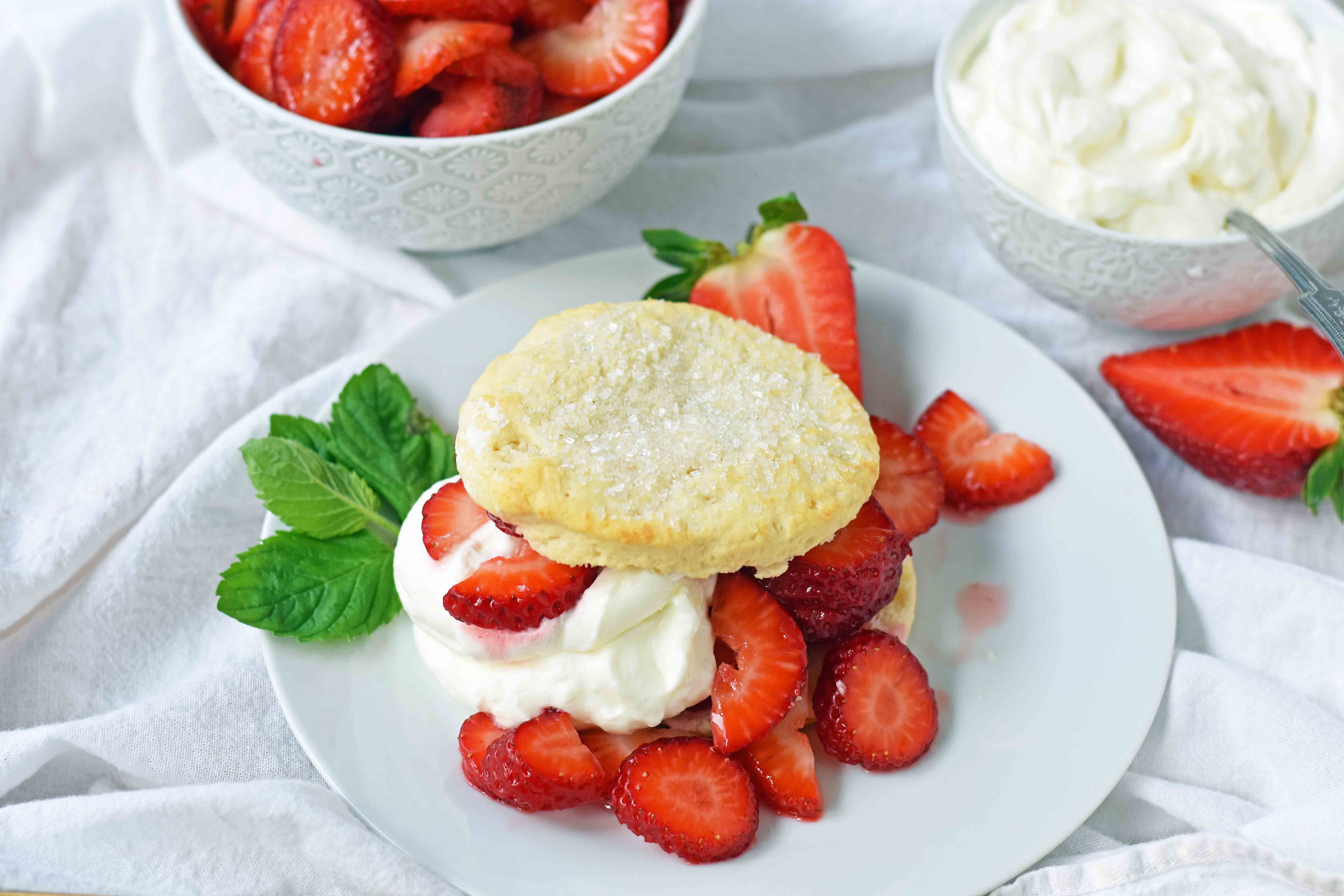 Strawberry Shortcake with Sweet Biscuits, Sugared Strawberries, and Homemade Sweetened Whipped Cream. The BEST Strawberry Shortcake Recipe. A Southern classic Strawberry Shortcake with biscuits. www.modernhoney.com