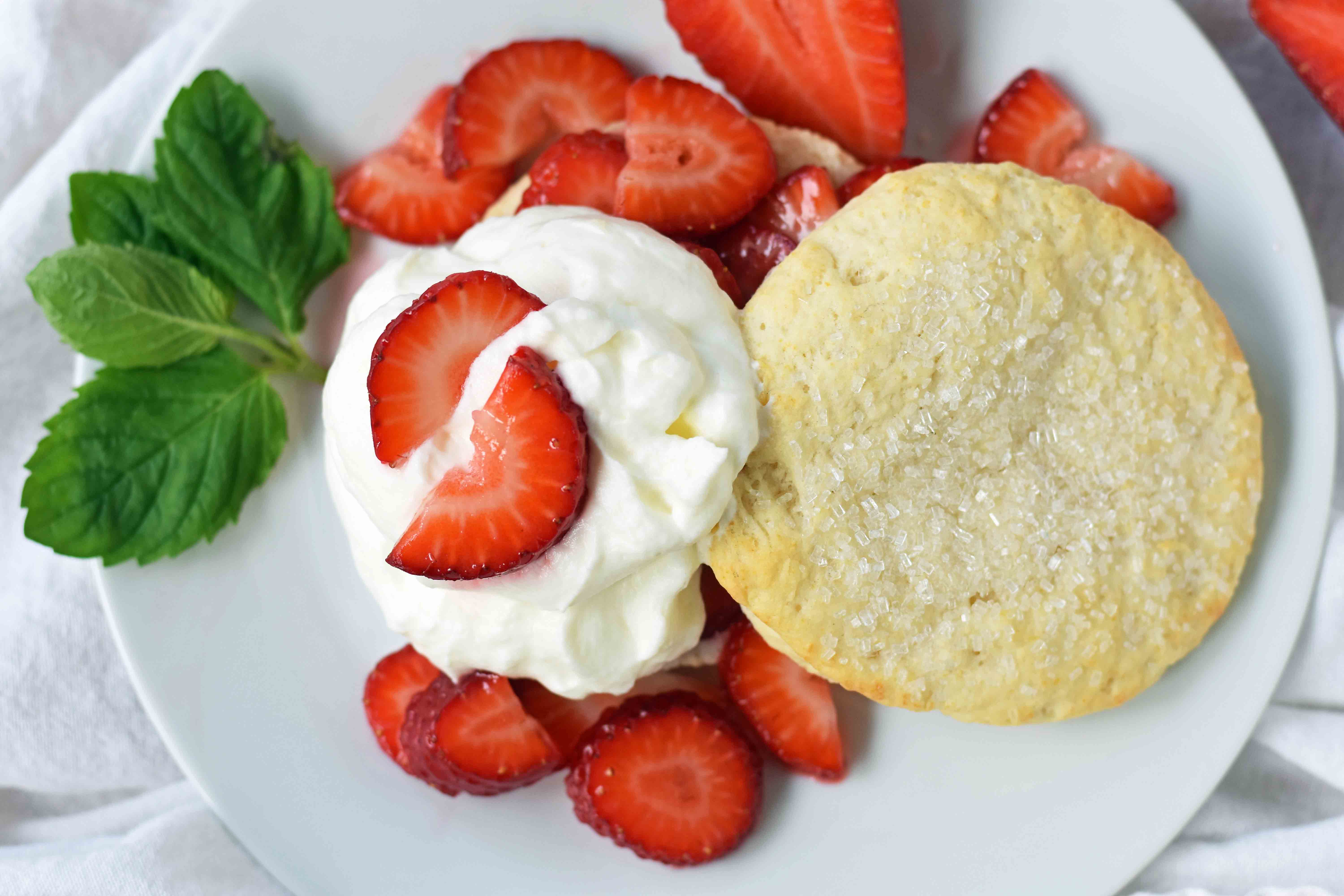 Strawberry Shortcake with Sweet Biscuits, Sugared Strawberries, and Homemade Sweetened Whipped Cream. The BEST Strawberry Shortcake Recipe. A Southern classic Strawberry Shortcake with biscuits. www.modernhoney.com