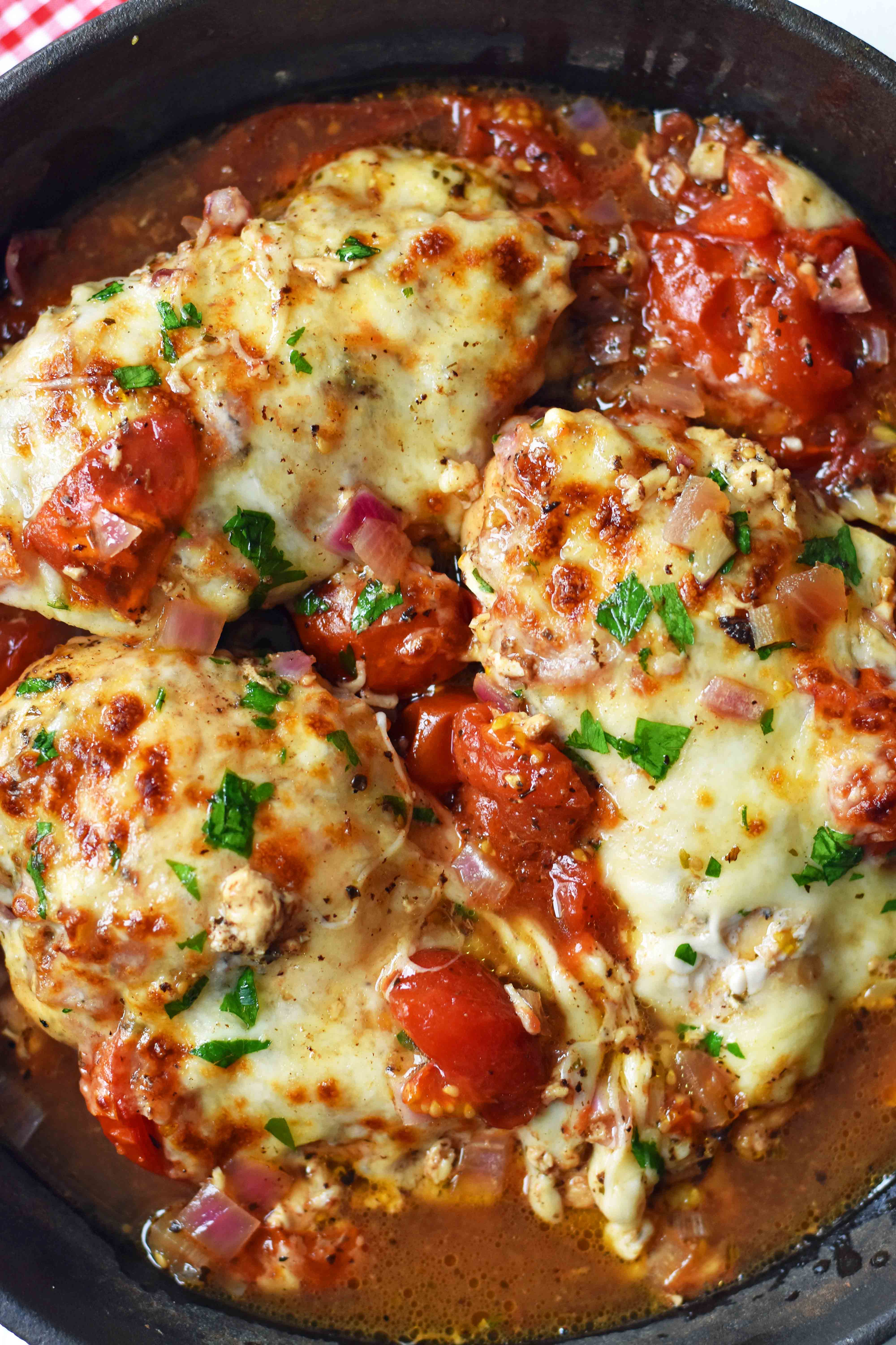 Baked Chicken Caprese. Oven-roasted chicken with Italian spices, sweet balsamic tomatoes, and melted mozzarella cheese. An easy 30-minute meal that your whole family will love. Chicken Breast with oven-roasted tomatoes and fresh mozzarella. www.modernhoney.com #dinner #30minutemeals #chicken