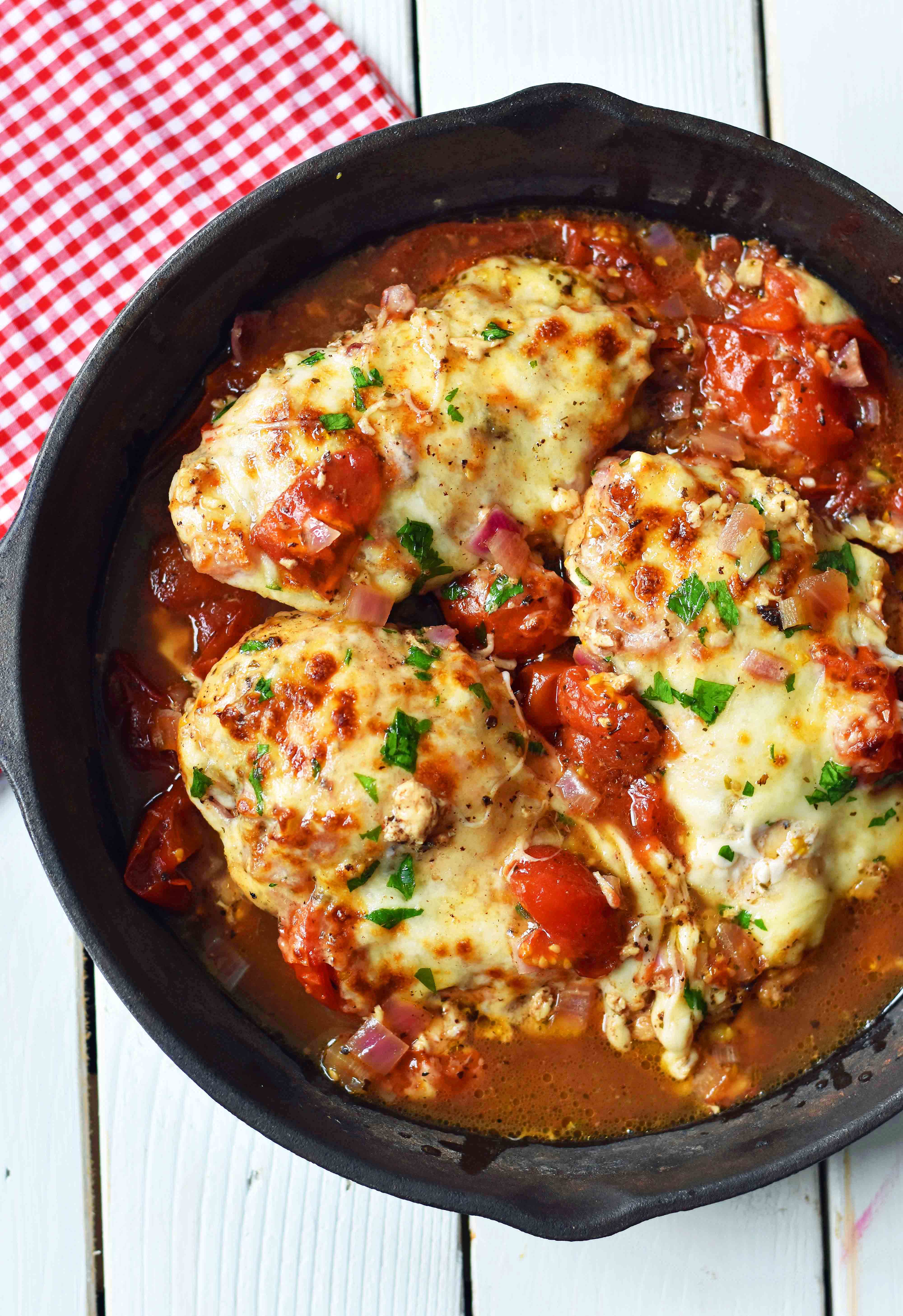 Baked Chicken Caprese. Oven-roasted chicken with Italian spices, sweet balsamic tomatoes, and melted mozzarella cheese. An easy 30-minute meal that your whole family will love. Chicken Breast with oven-roasted tomatoes and fresh mozzarella. www.modernhoney.com #dinner #30minutemeals #chicken