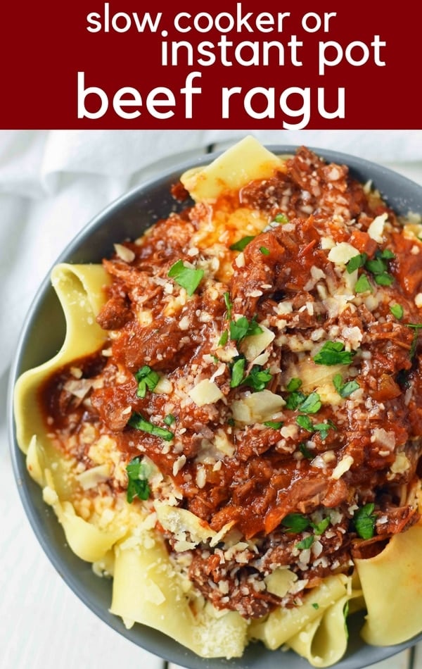 This braised shredded beef ragu with pappardelle pasta can be made in a slow cooker or instant pot pressure cooker. It makes the most tender, flavorful beef in a rich, velvety sauce. It is the ultimate comfort meal in a bowl! This Beef Ragu can be put on top of spiralized vegetables, mashed potatoes, or polenta for a gluten-free dinner. www.modernhoney.com 