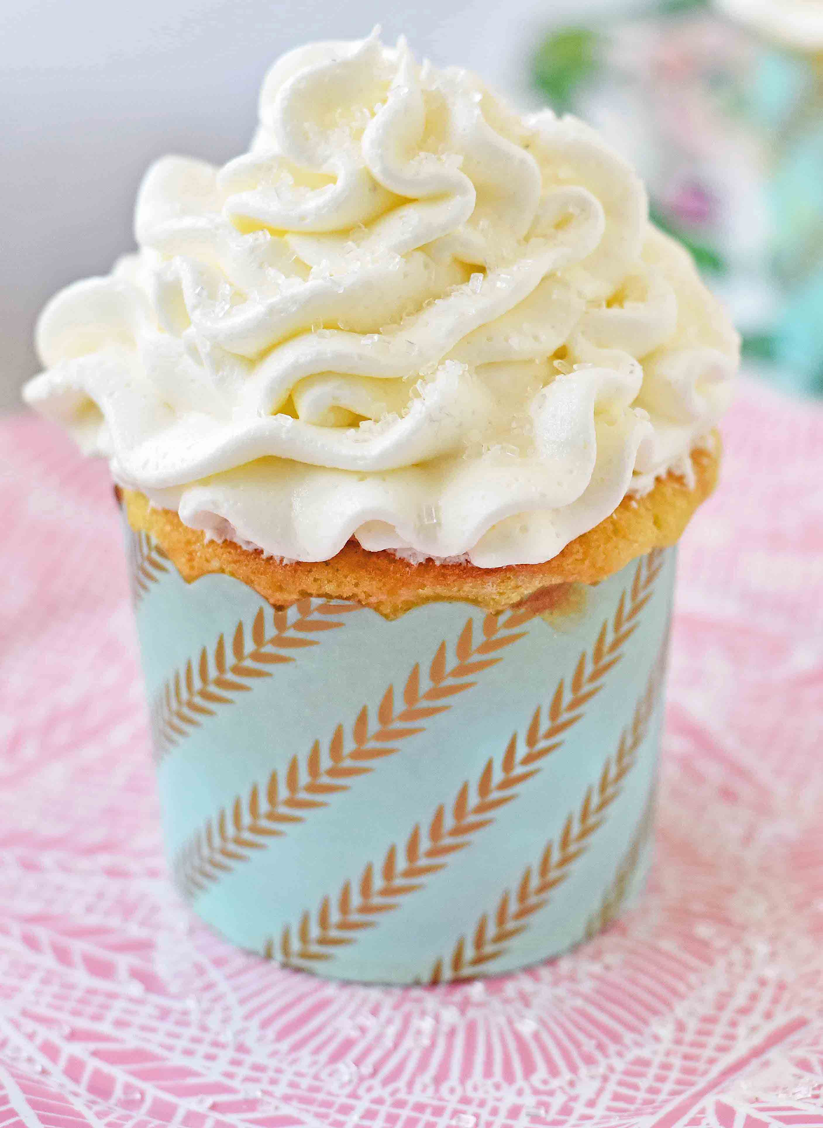 Best Vanilla Cupcakes Recipe. How to make soft and moist vanilla cupcakes. Homemade Vanilla Cupcakes with Vanilla Buttercream Frosting. www.modernhoney.com