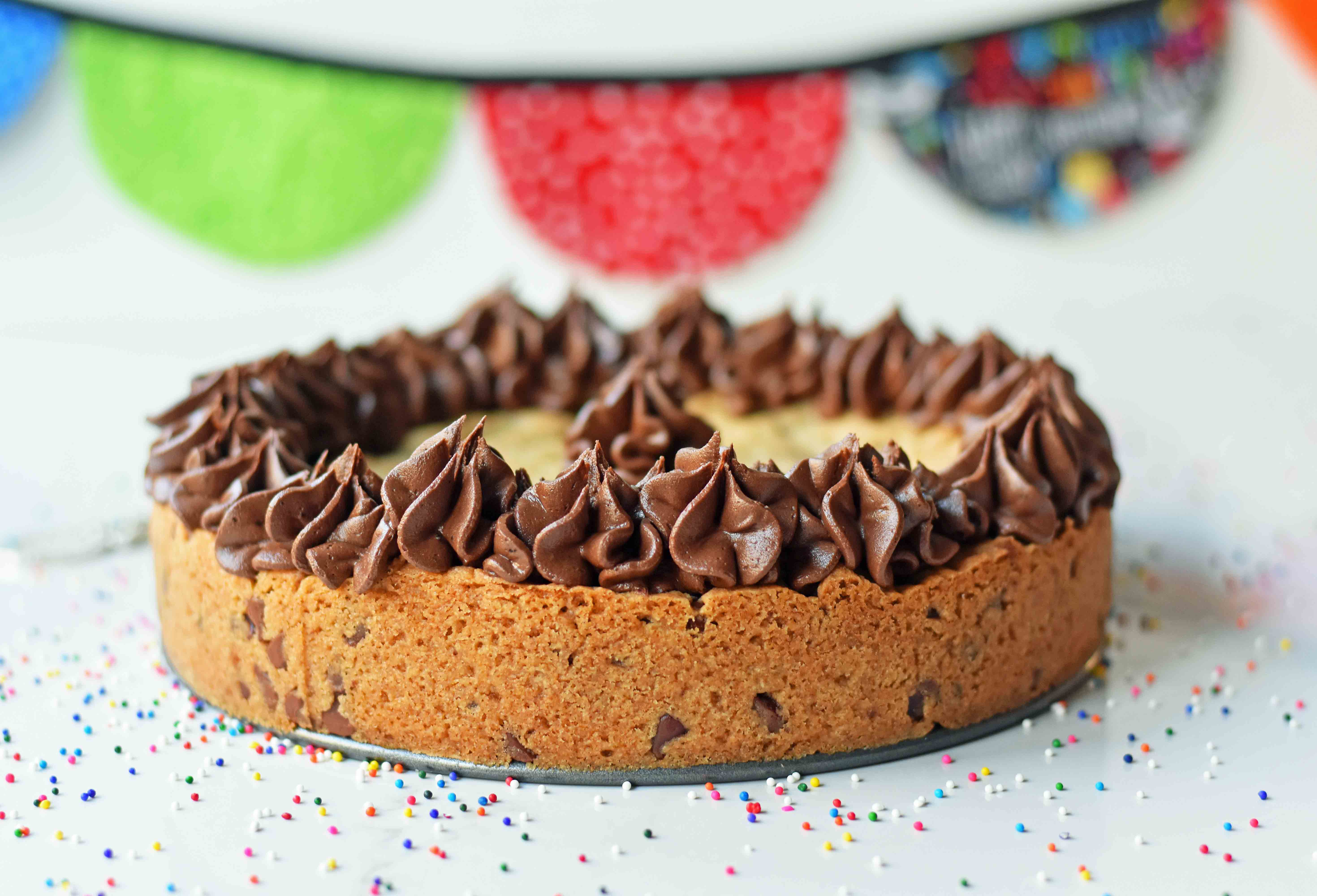 Chocolate Chip Cookie Cake. The BEST Homemade Cookie Cake. This Gigantic Frosted Chocolate Chip Cookie is perfect for birthdays or celebrations. A large decorated chocolate chip cookie recipe. www.modernhoney.com #cookie #cookies #largecookie #giganticcookie #frostedcookie #happybirthdaycookie #birthdaycookie #birthdaycookiecake #birthdaydesserts www.modernhoney.com